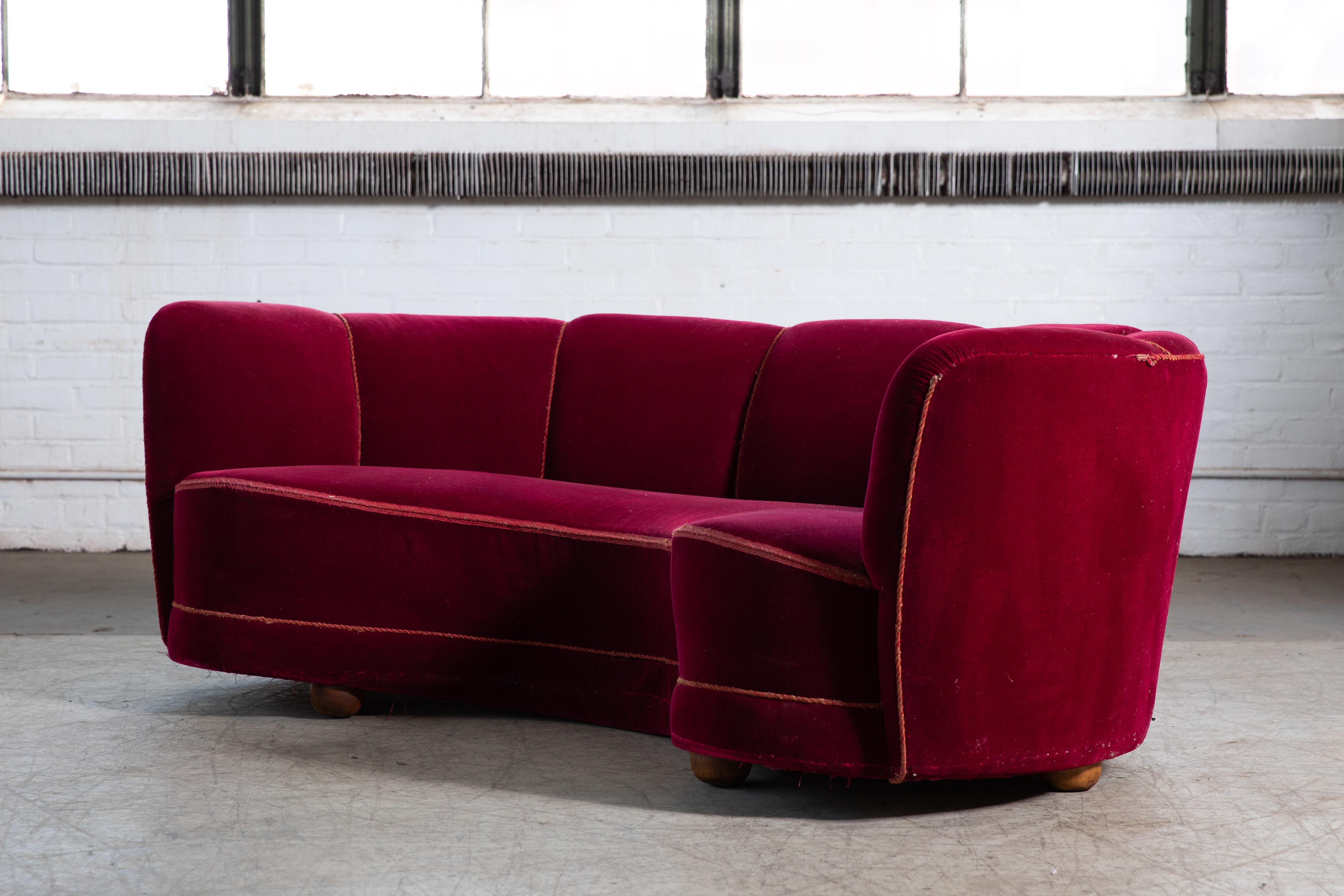 curved red sofa