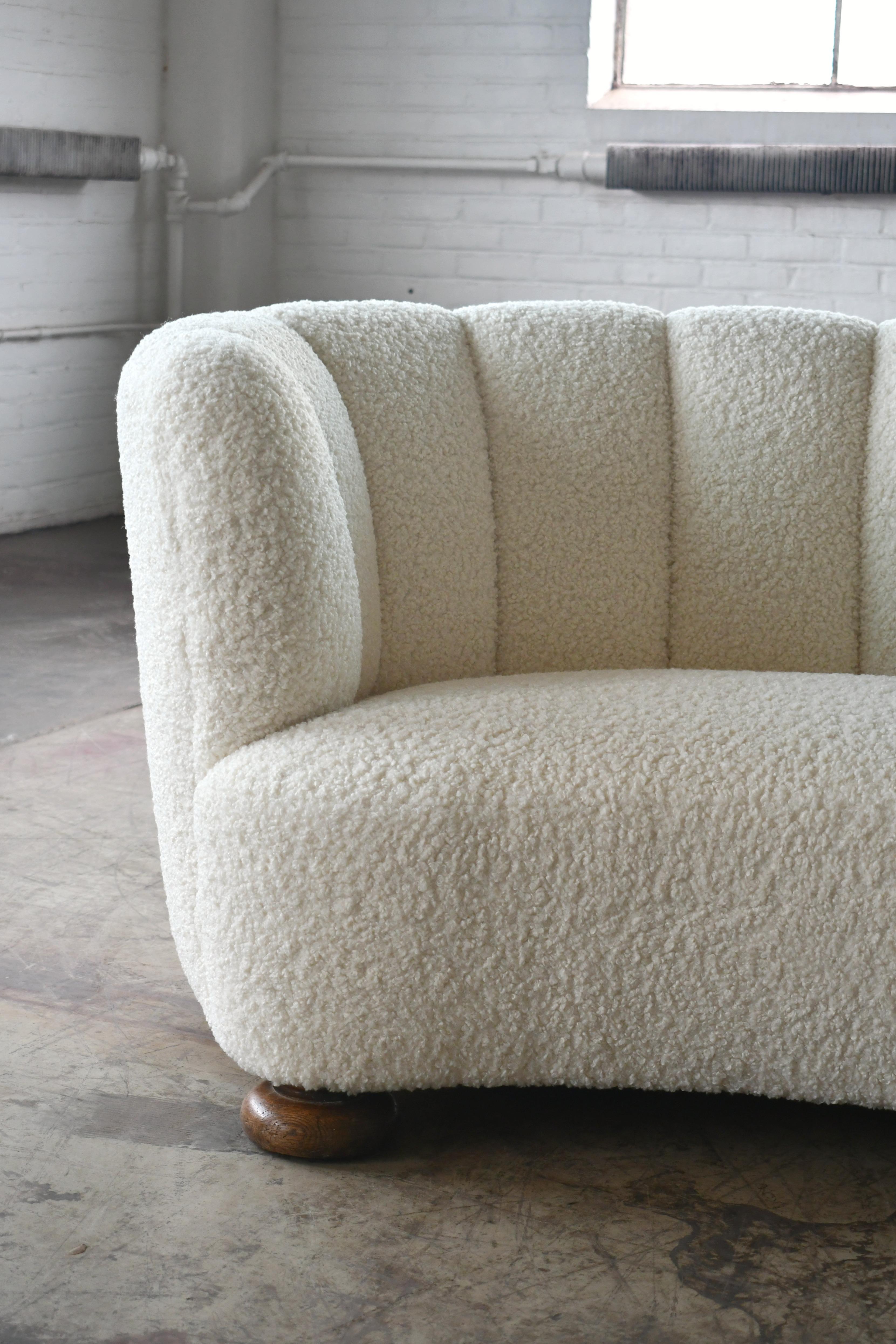 Mid-Century Modern Danish 1940s Large Curved Banana Shape Sofa Newly Re-Upholstered in White Boucle