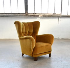 Danish 1940s Large Lounge Chair with Organic Rounded Proportions Yellow Mohair.