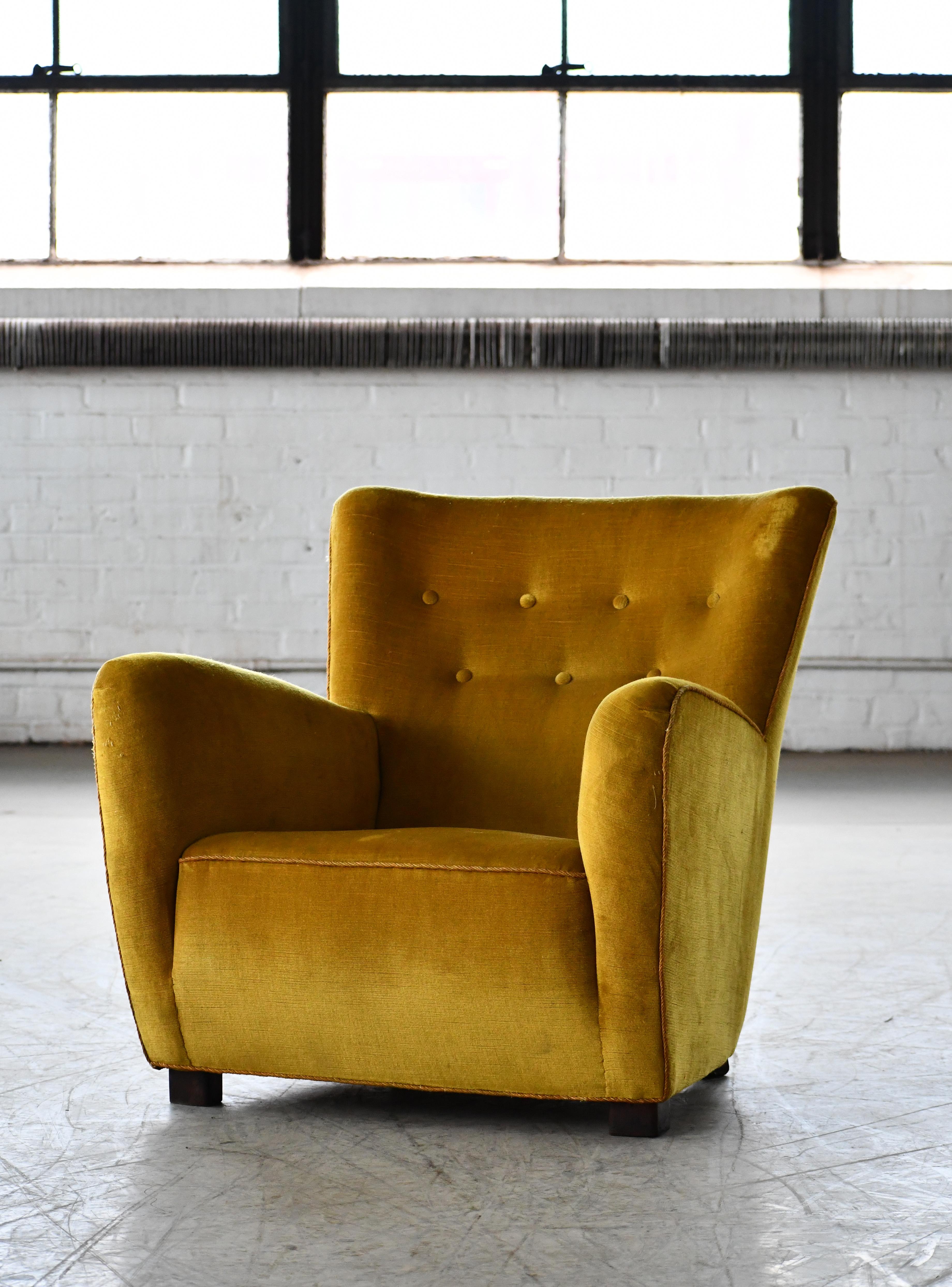 Very cool and rare 1940s lounge chair attributed to Master Furniture Maker Georg Kofoed of Copenhagen. We love the stance and the overall dynamic design lines that are very reminiscent of Viggo Boesen's iconic designs. The chair is unmarked. Solid