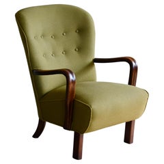 Danish 1940
s lounge chair with Open Armrests in stained Oak