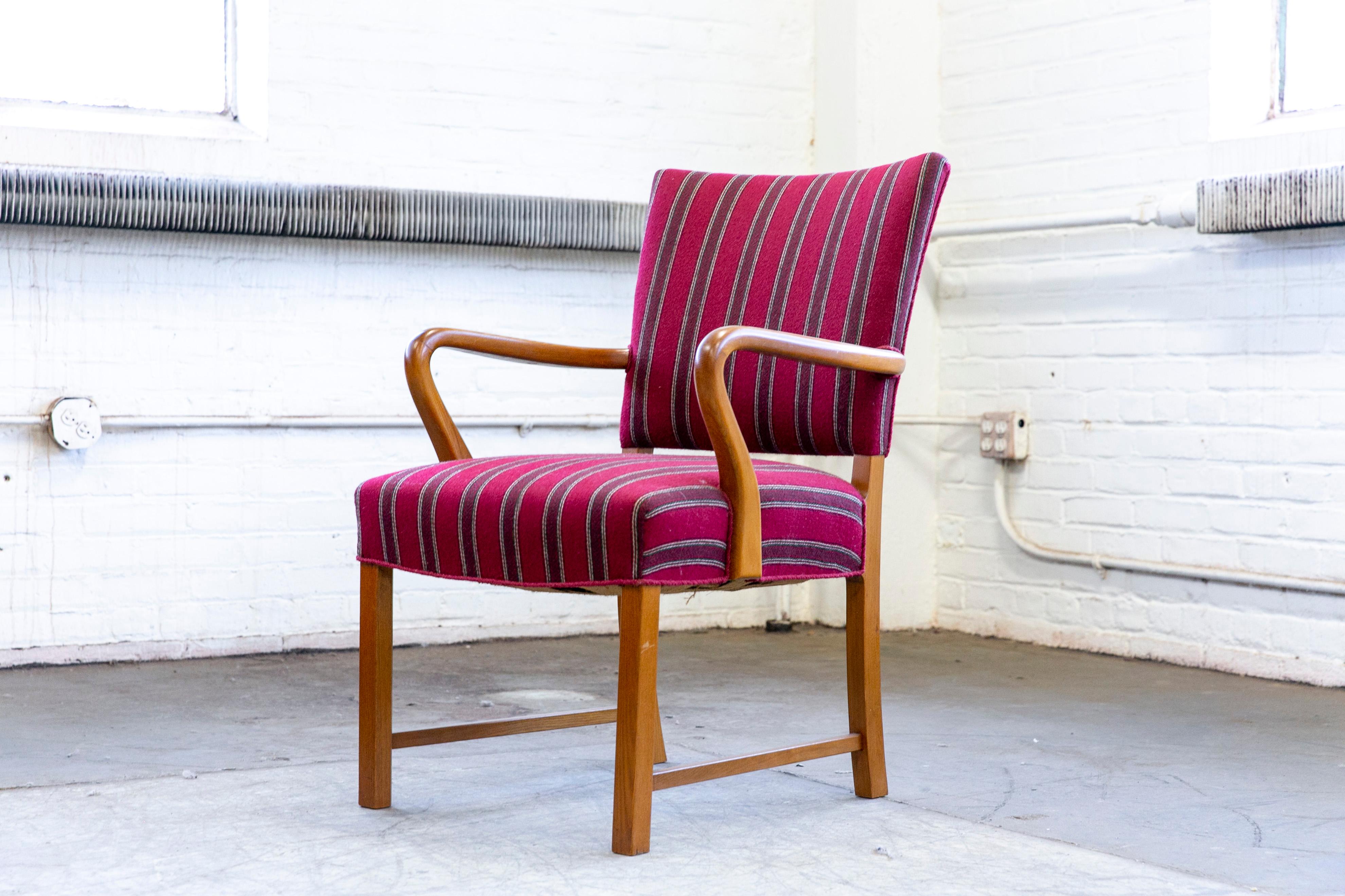 Classic elegant Danish high back armchair from the 1940s by Alfred Christensen for Slagelse Mobelvaerk with open armrests in beautifully curved mahogany stained beech. Nice slim elegant silhouette. Solid and sturdy construction with the fabric in