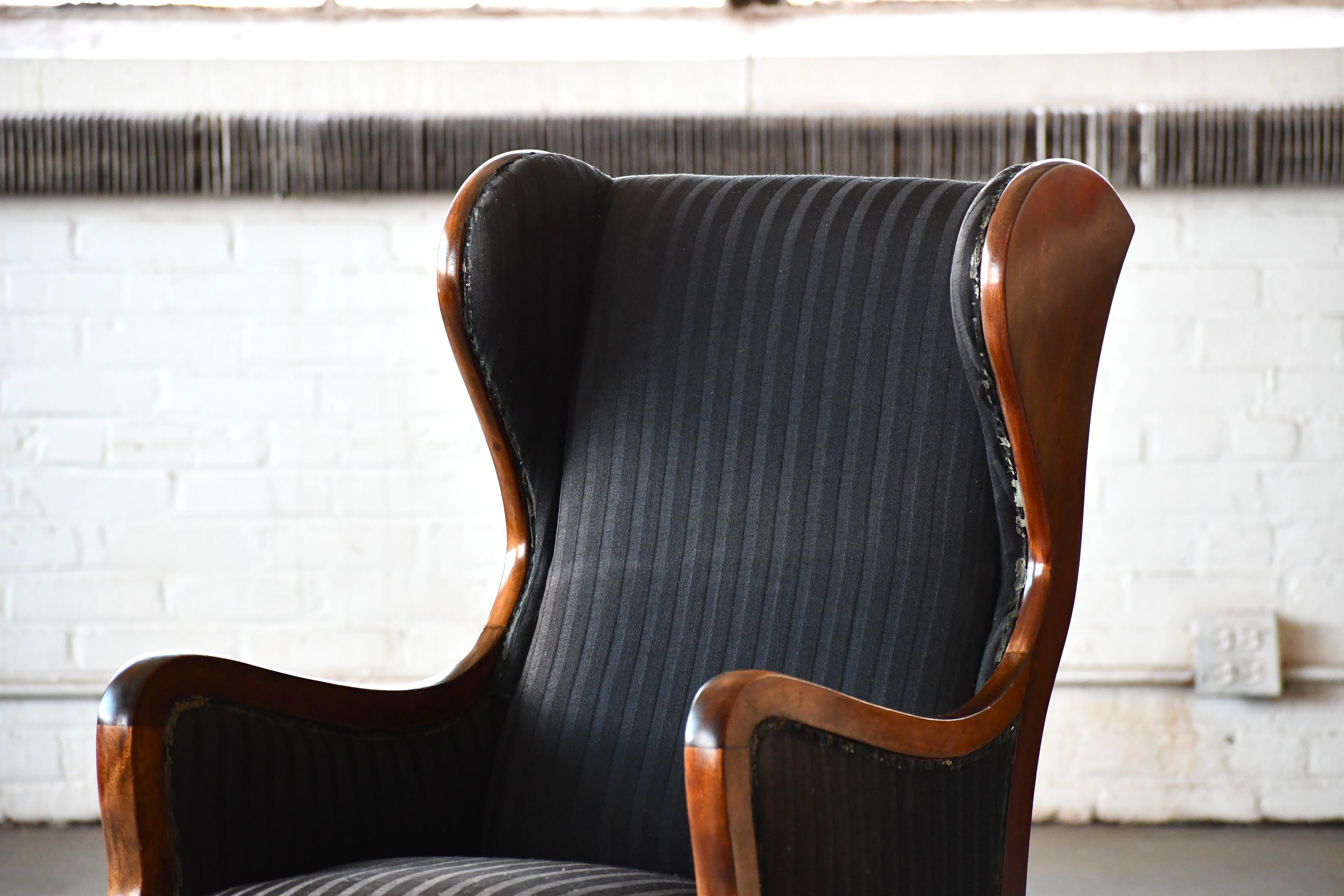 Scandinavian Modern Danish 1940s Wingback Chair in Beech by Master Carpenter Frits Henningsen For Sale