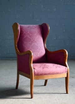 Danish 1940s Wingback Chair in Mahogany by Master Carpenter Frits Henningsen