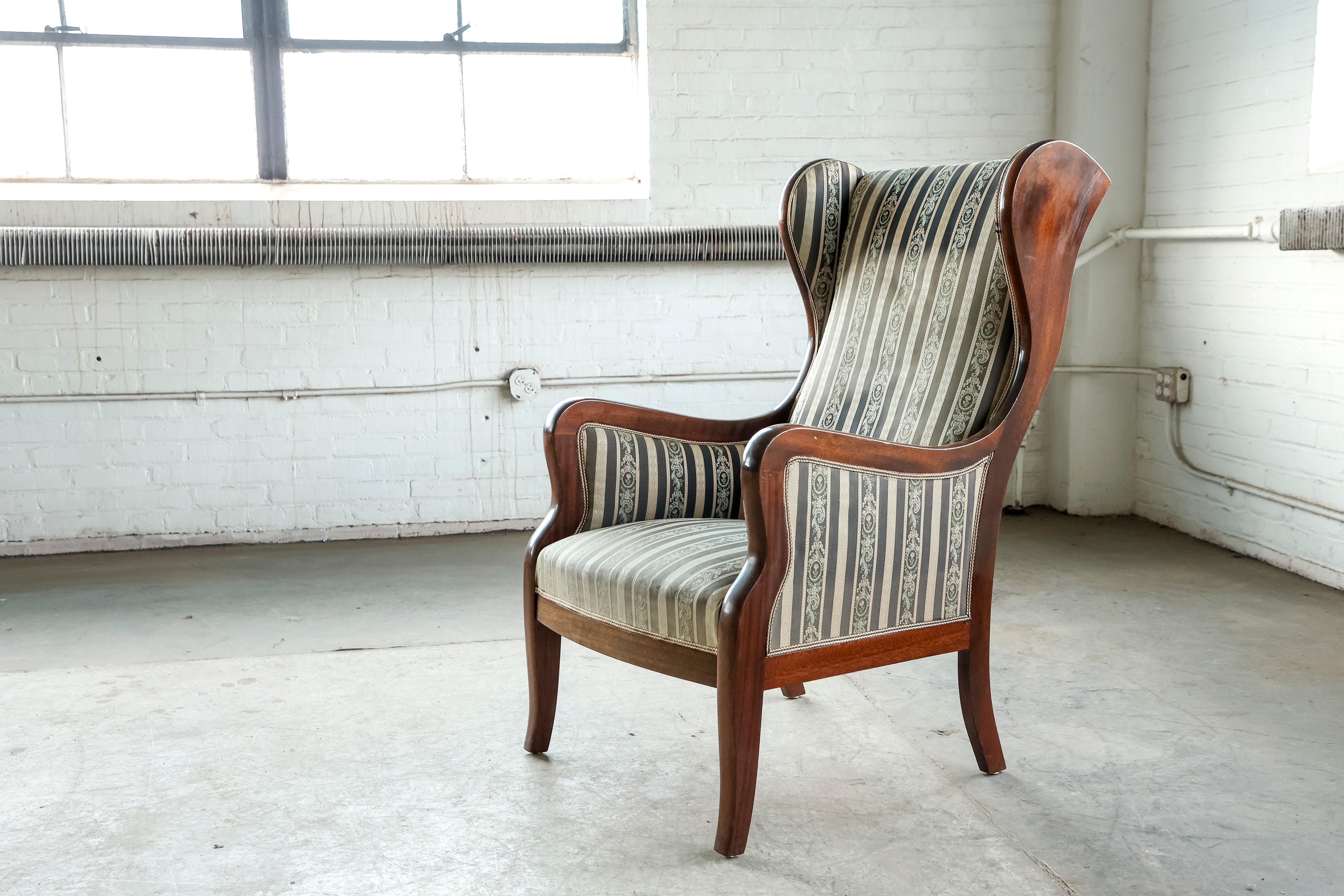 Scandinavian Modern Danish 1940s Wingback Chair in Mahogany by Master Carpenter Frits Henningsen