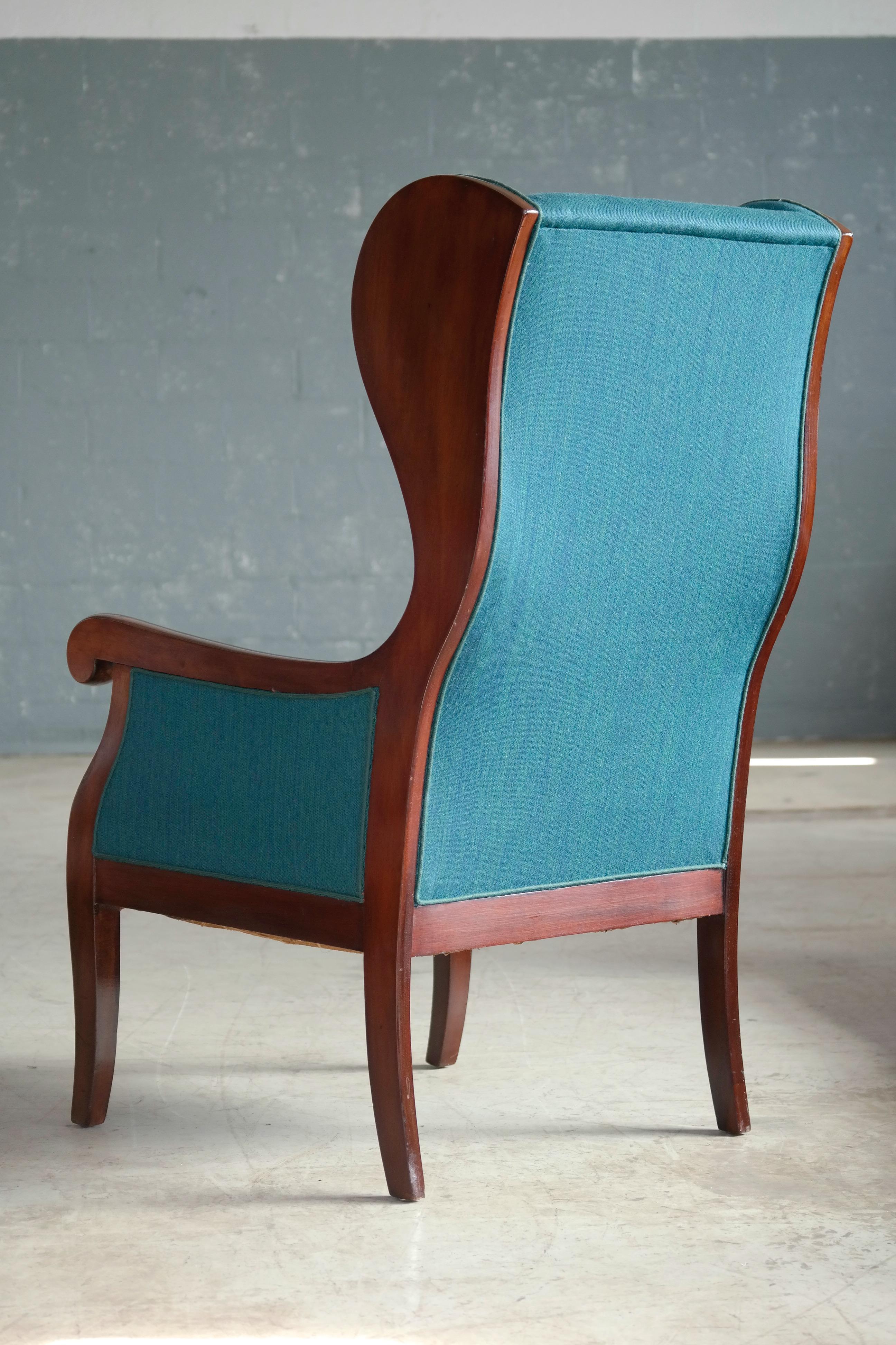 Mid-20th Century Danish 1940s Wingback Chair in Mahogany by Master Carpenter Frits Henningsen