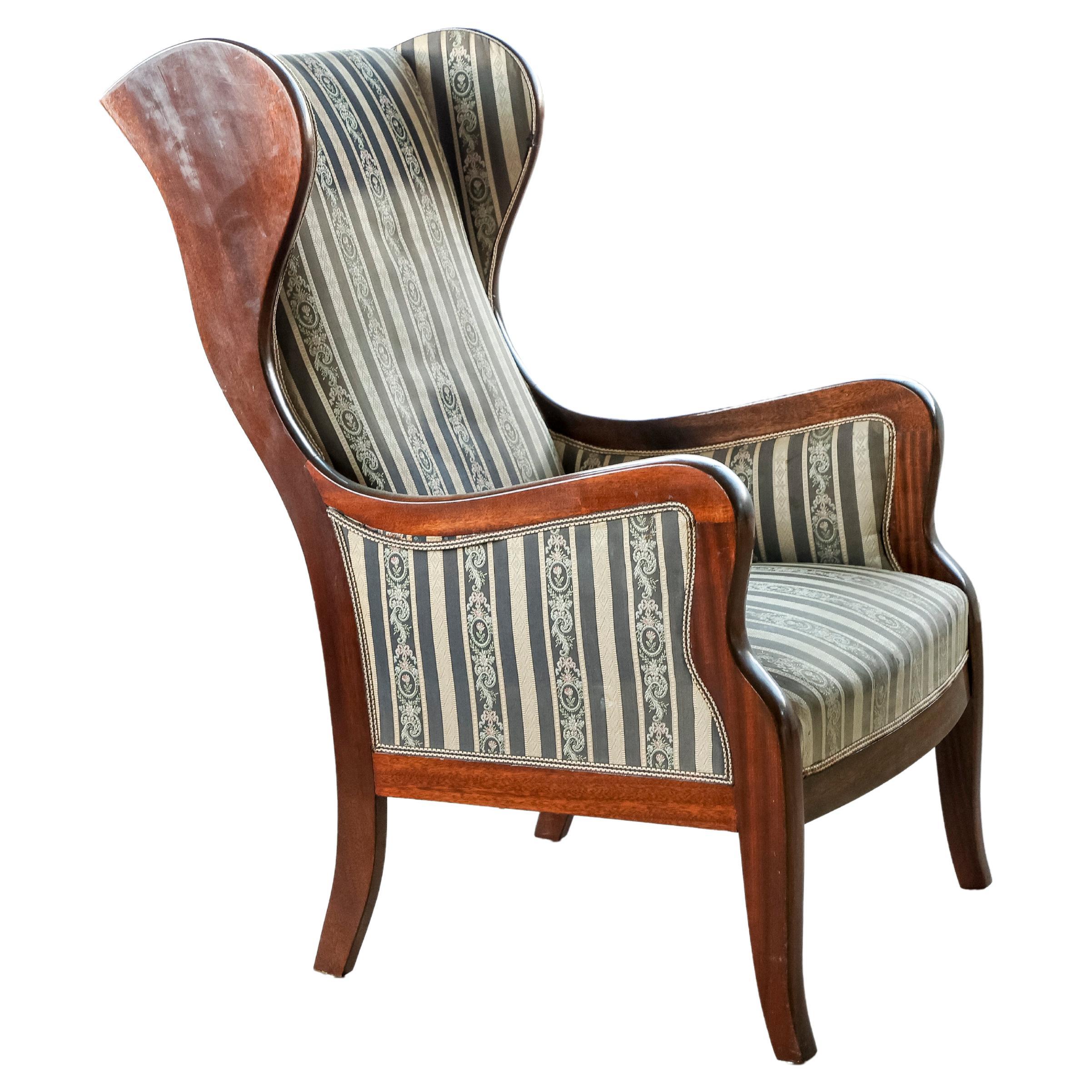 Danish 1940s Wingback Chair in Mahogany by Master Carpenter Frits Henningsen