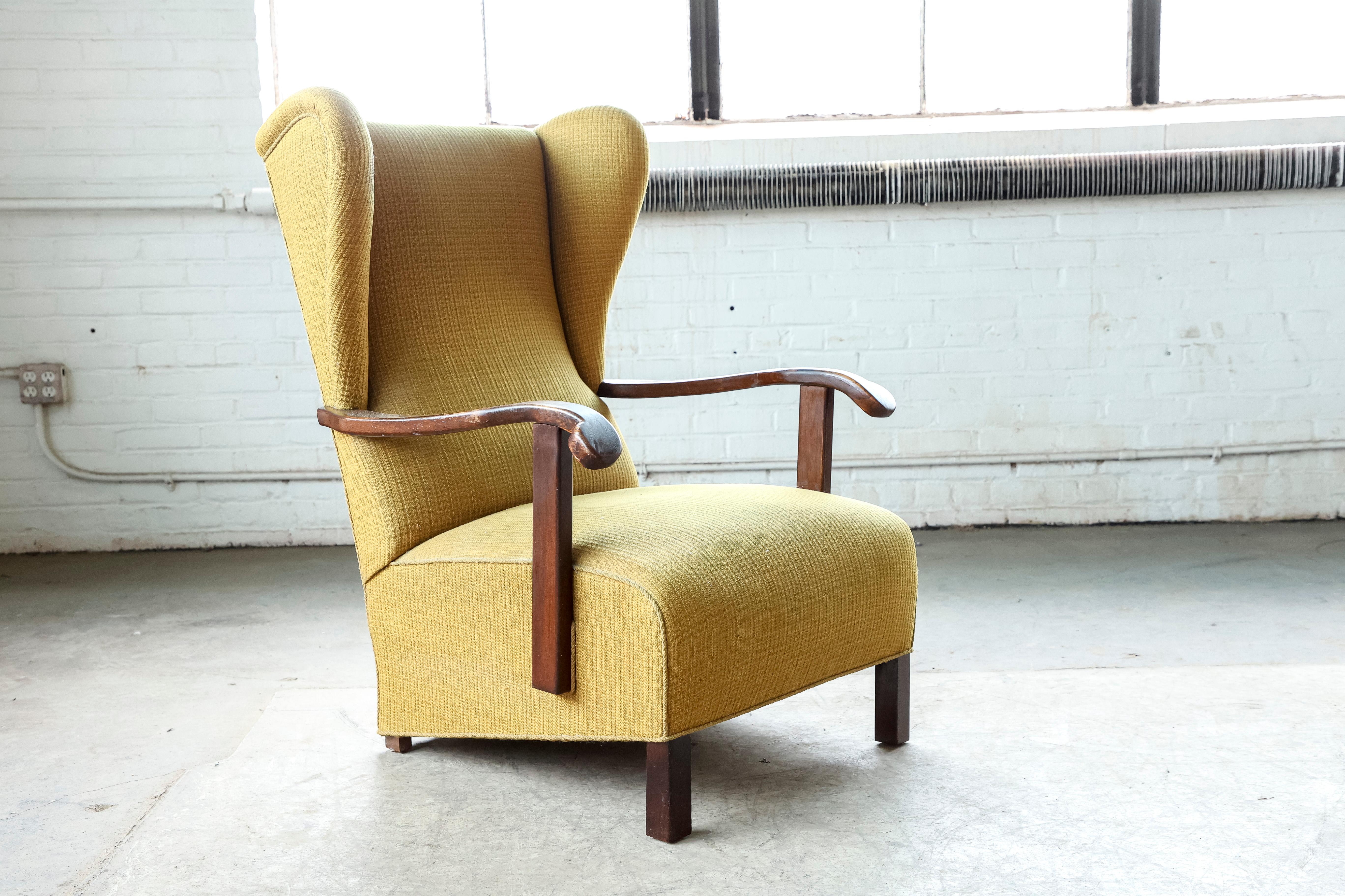 Mid-Century Modern Danish 1940's Wingback Lounge Chair with Armrests in Oak and Rocking Function
