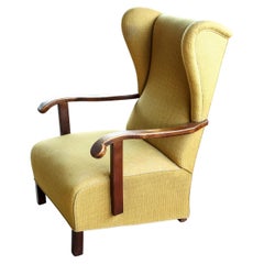 Danish 1940's Wingback Lounge Chair with Armrests in Oak and Rocking Function