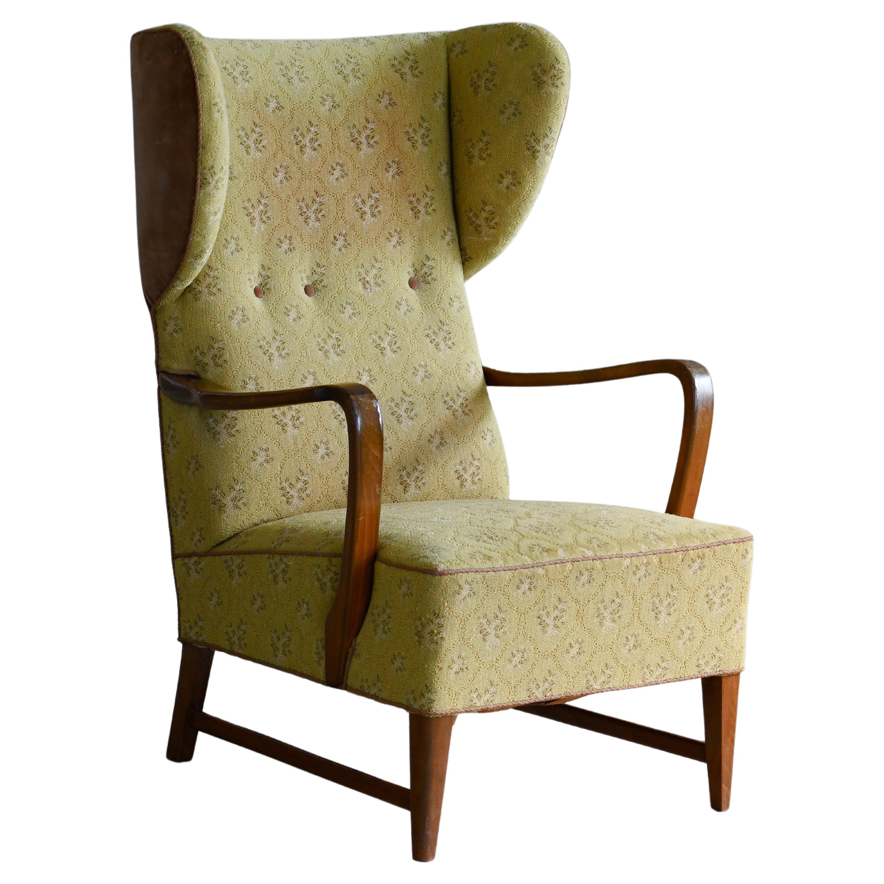 Danish 1940s Wingback Lounge Chair with Open Armrests For Sale