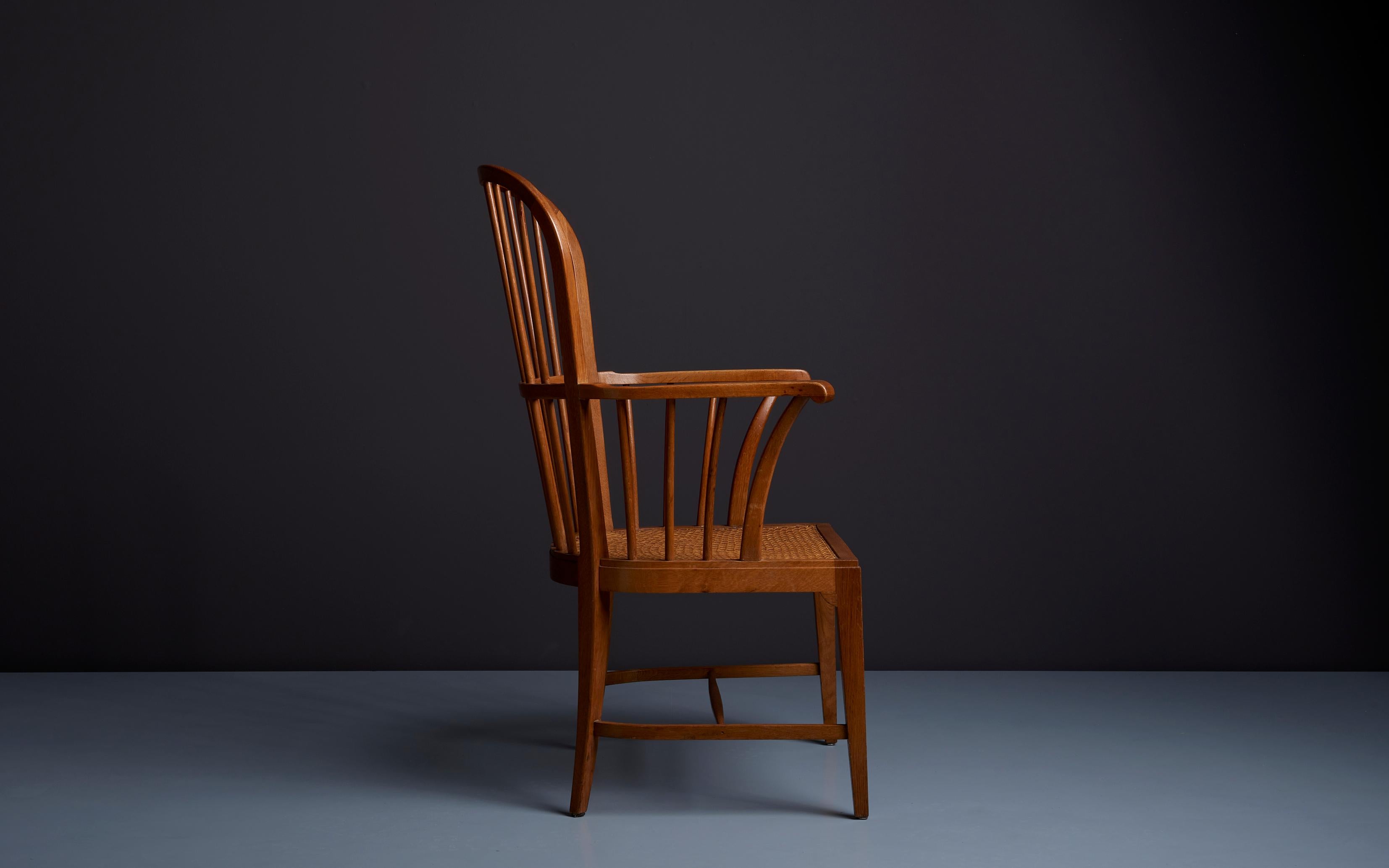 Mid-20th Century Danish 1950s Oak Windsor Arm Chair with Webbed Seat For Sale
