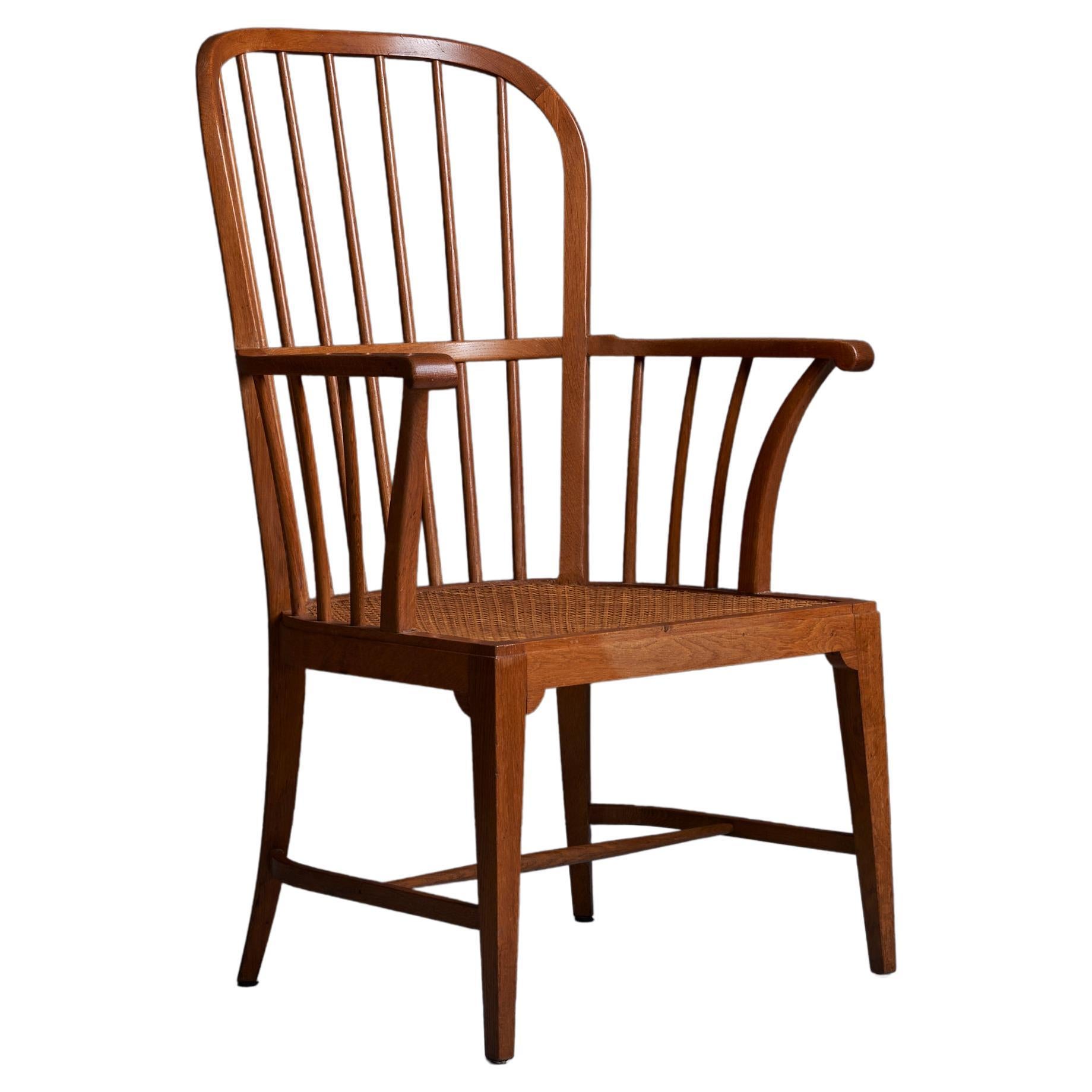 Danish 1950s Oak Windsor Arm Chair with Webbed Seat For Sale
