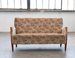 Danish 1950s Settee with Wooden Armrest by Orla Mølgaard Amber Colored Frame