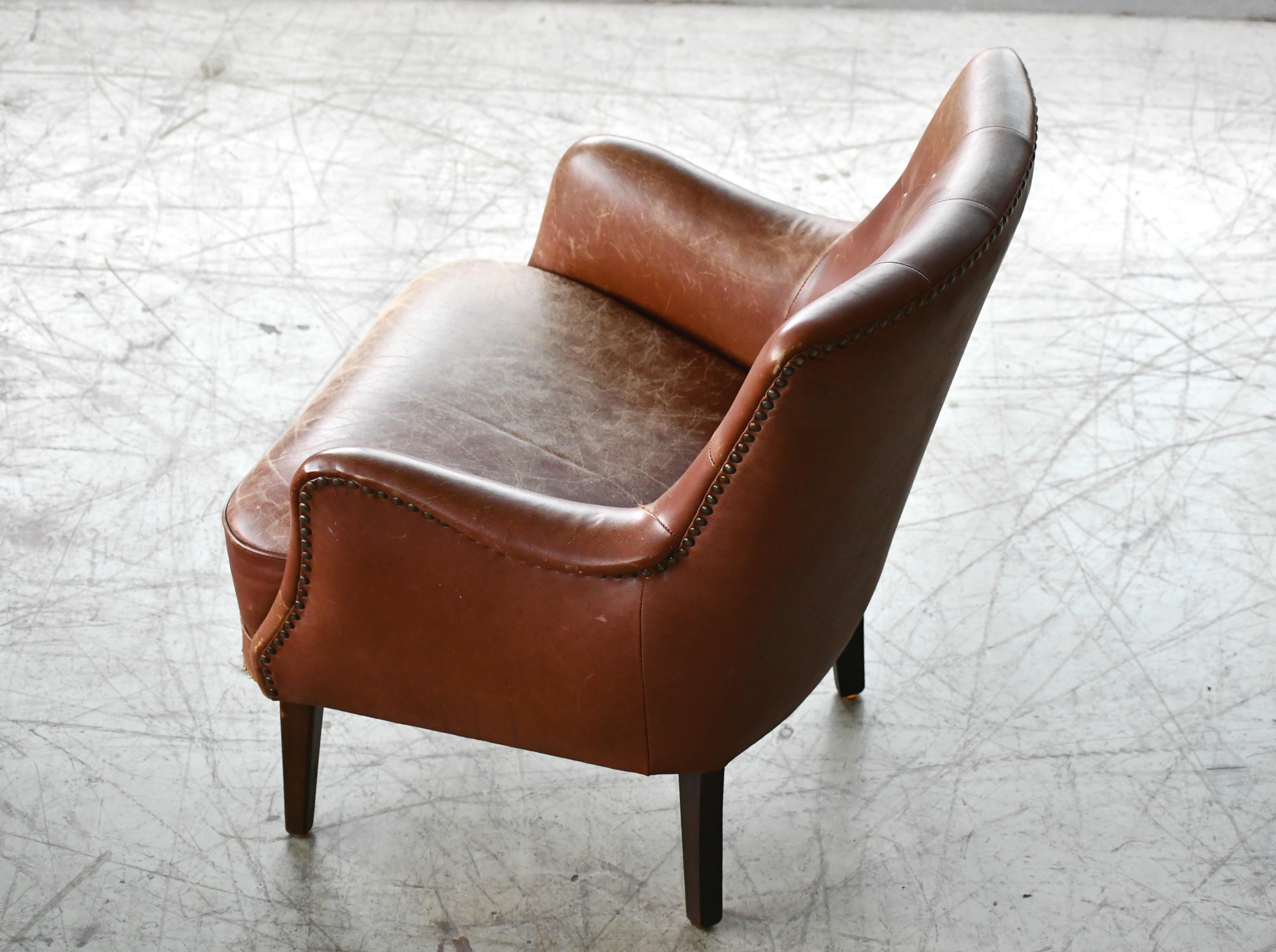 Mid-20th Century Danish 1950s Small Scale Tufted Easy Chair with Worn Brown Leather