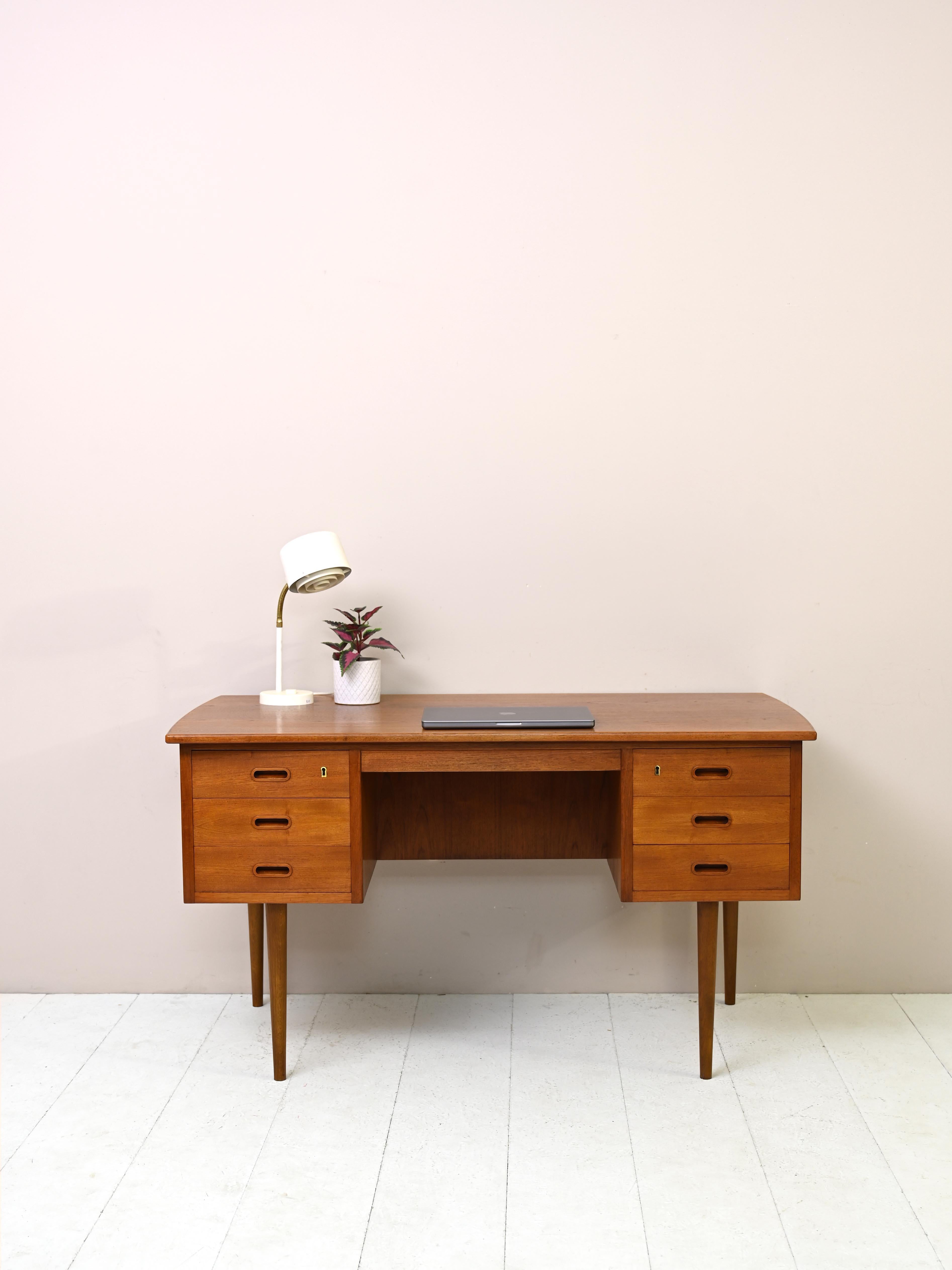 Original vintage office table with drawers. 

An elegant desk of Danish manufacture, also finished on the back and therefore called 