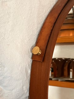 Danish 1950's walnut, brass and leather mirror Ø51cm H60.5cm all original