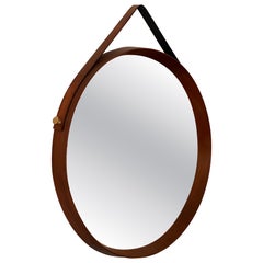 Danish 1950's walnut, brass and leather mirror Ø51cm H60.5cm all original
