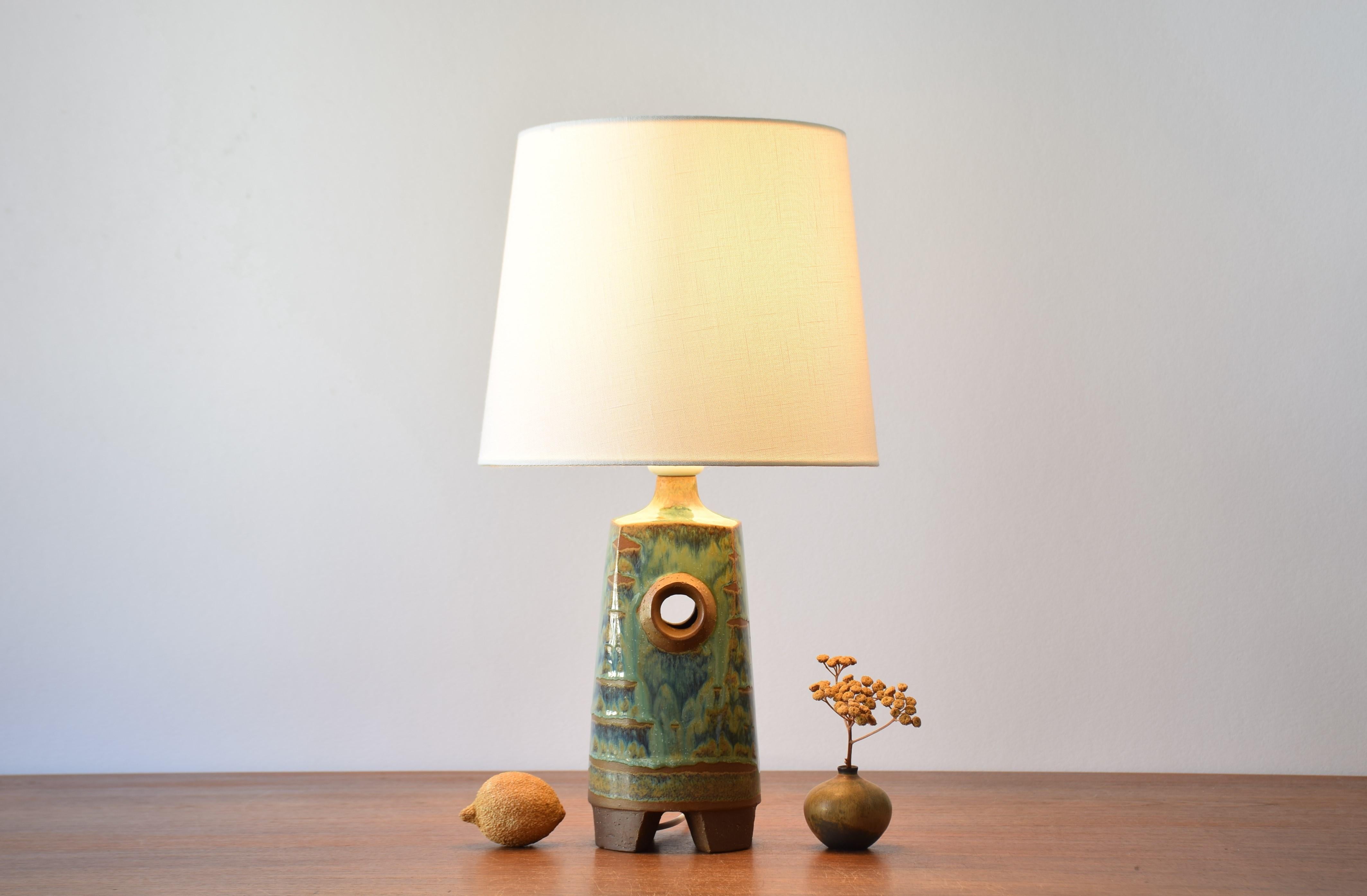 Sculptural Midcentury Danish table lamp from the ceramic workshop of Michael Andersen & Søn (Michael Andersen & Son) on the island Bornholm. Designed and made ca 1960s. The design is attributed to either Marianne Starck or Knud Basse but not