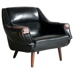 Danish 1960s Space Age Lounge Chair in Naugahyde and Rosewood by H.W. Klein