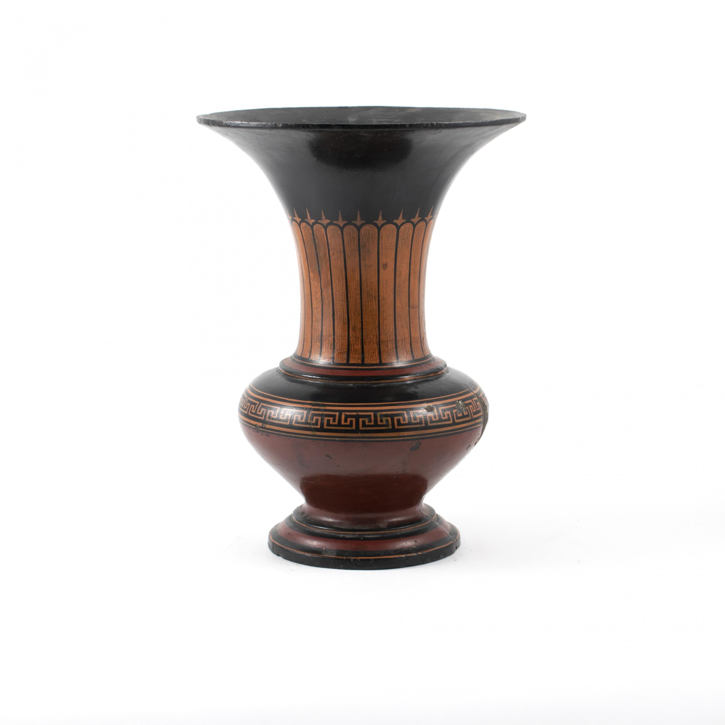 Cast iron vase in the ancient style. Black, red and burnt orange decorations.
In original and untouched condition with beautiful patina consistent with age and use.
Very decorative and elegant form.
Denmark, mid-19th century.