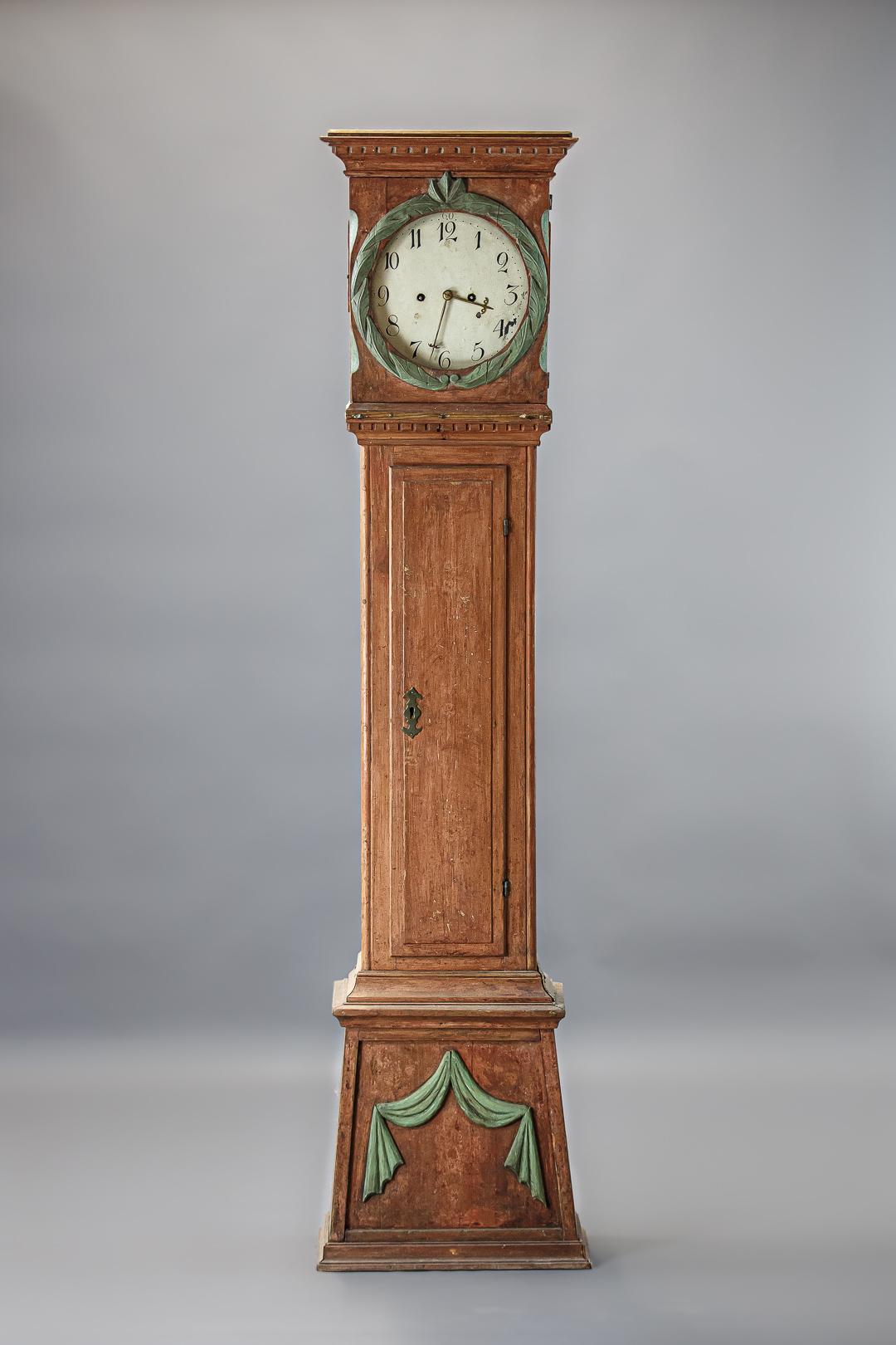 Early 19th century Danish clock, original painted finish, intricate wood carving. Appears internals have been updated and replaced, sold as decorative only, but mechanics, weights and pendulum all present.