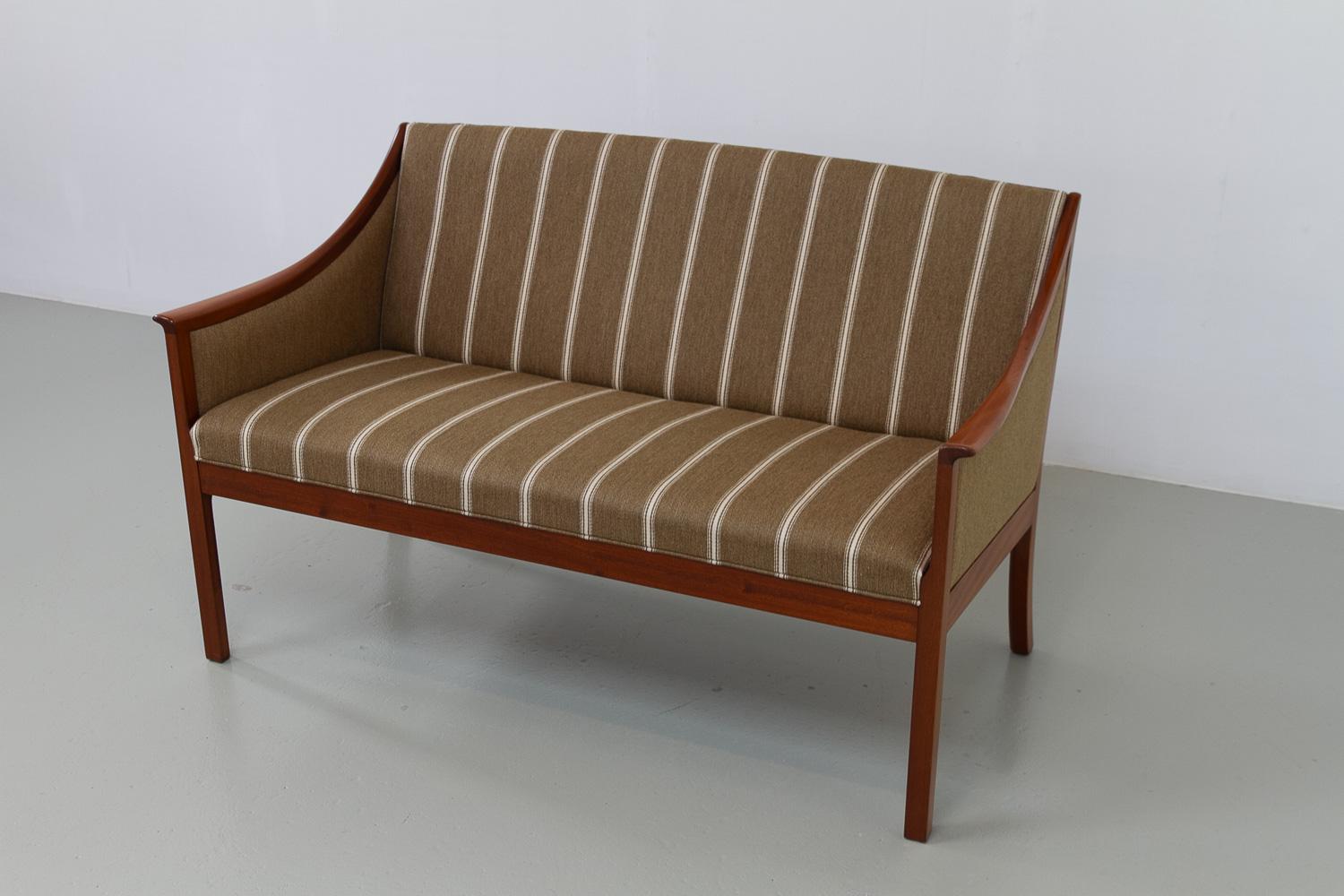 Danish 2 Seater Sofa by Ole Wanscher for PJ Møbler, 1960s. 

Scandinavian Mid-Century Modern two seater sofa designed by professor Ole Wanscher for Poul Jeppesens Møbelfabrik A/S Denmark. 
Light and elegant sofa with frame in solid Mahogany and