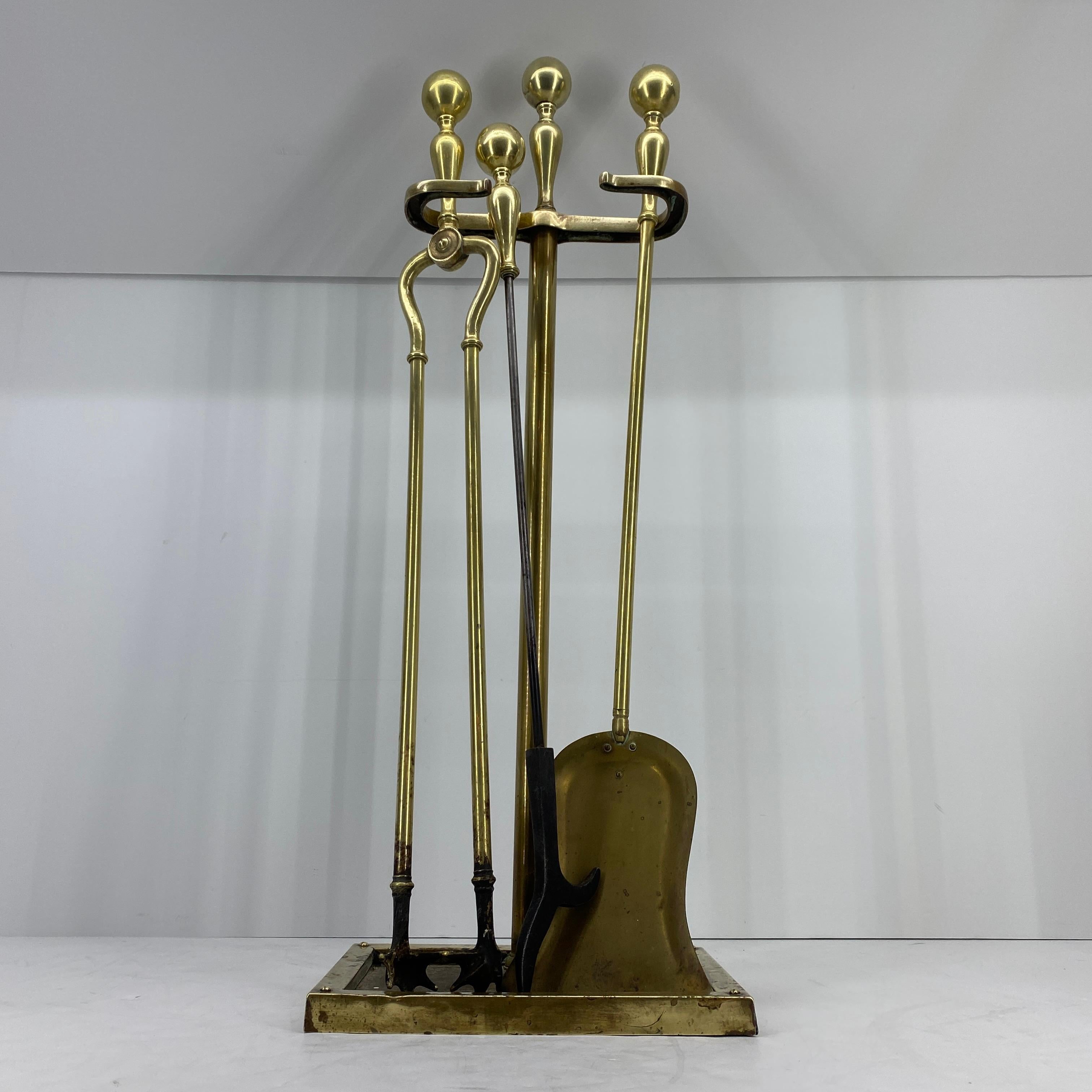 Danish 3-piece set of brass fireplace tools and stand, late 19th century.