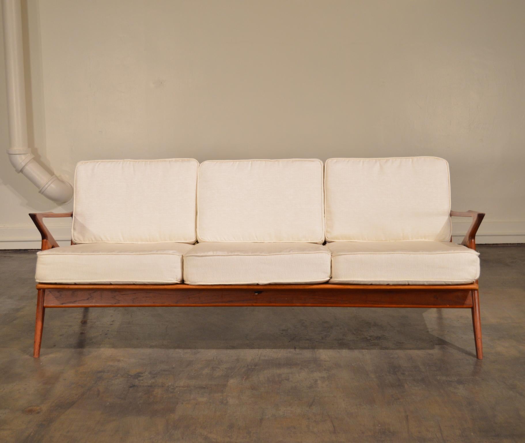 3-seat teak sofa designed by Poul Jensen. Manufactured in Denmark for Selig. The 