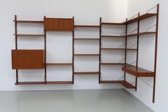 Danish 6-Bay Modular Teak Corner Wall Unit by Poul Cadovius for Cado, 1960s.