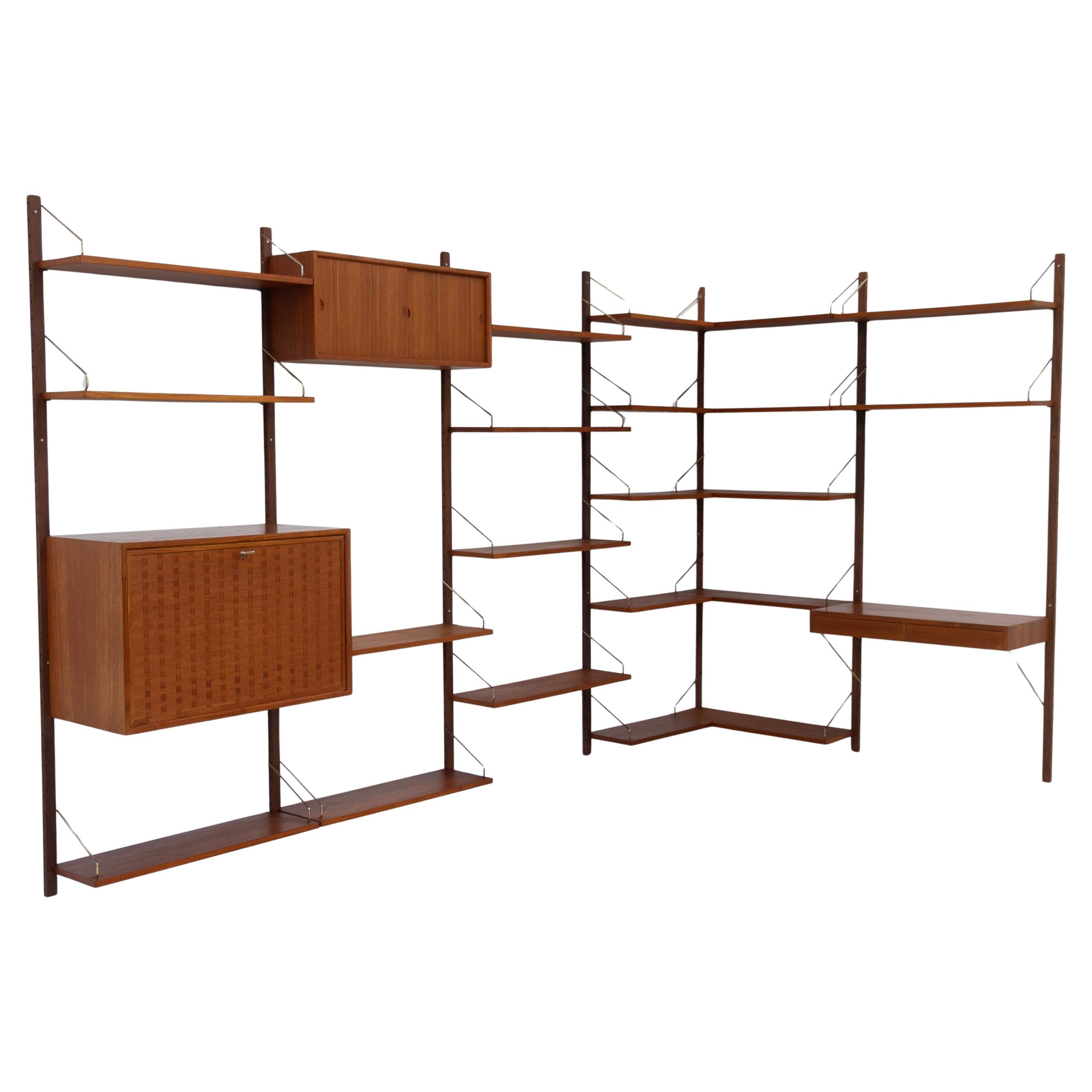 Danish 6-Bay Modular Teak Corner Wall Unit by Poul Cadovius for Cado, 1960s.