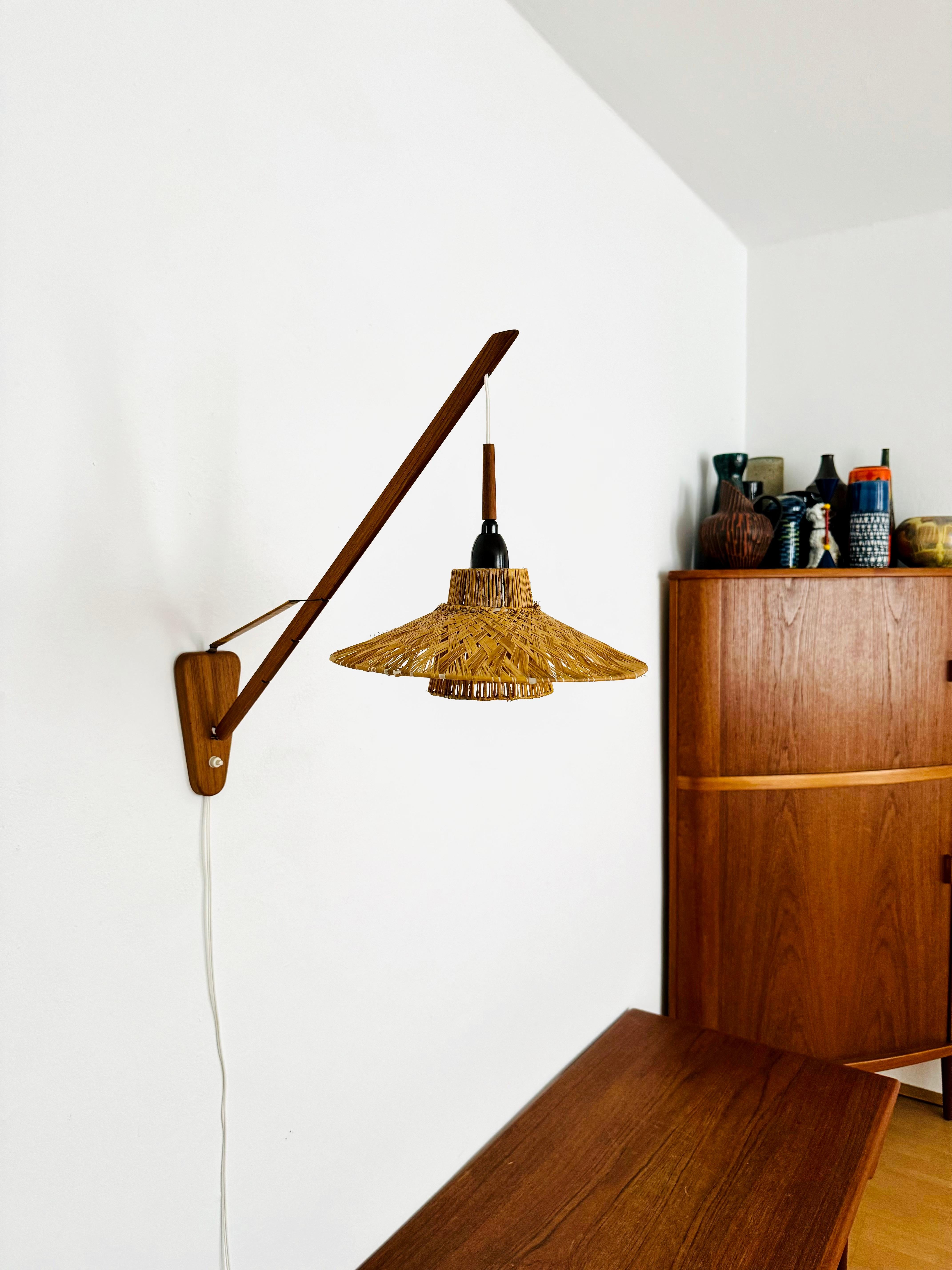 Danese Lampada da parete regolabile danese in teak e rafia Bast in vendita