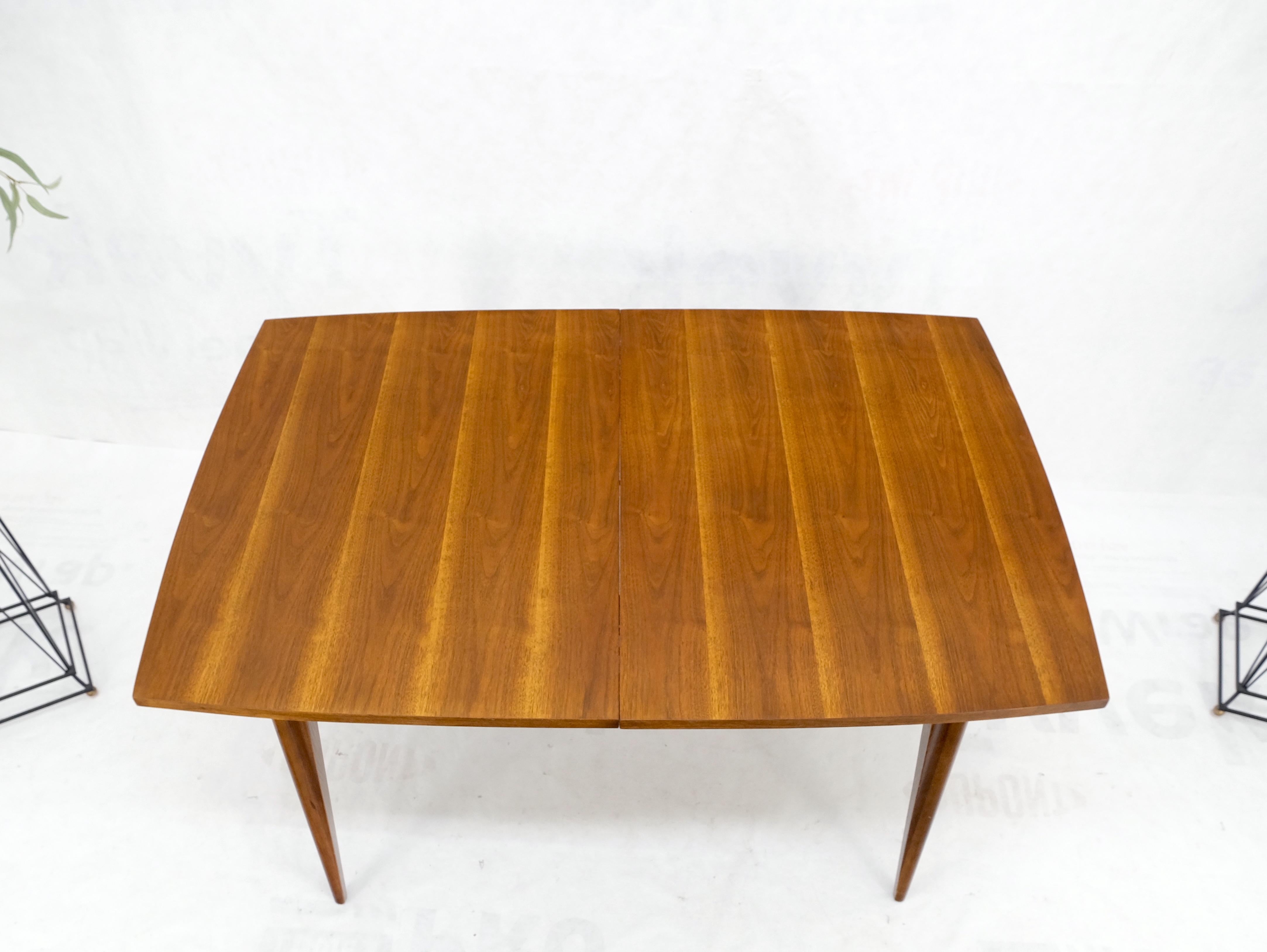 Danish American Mid-Century Modern walnut boat shape dining table 1 leaf mint!
Extension leaf 12 inches across.

Measure: total length: 72 inches across.