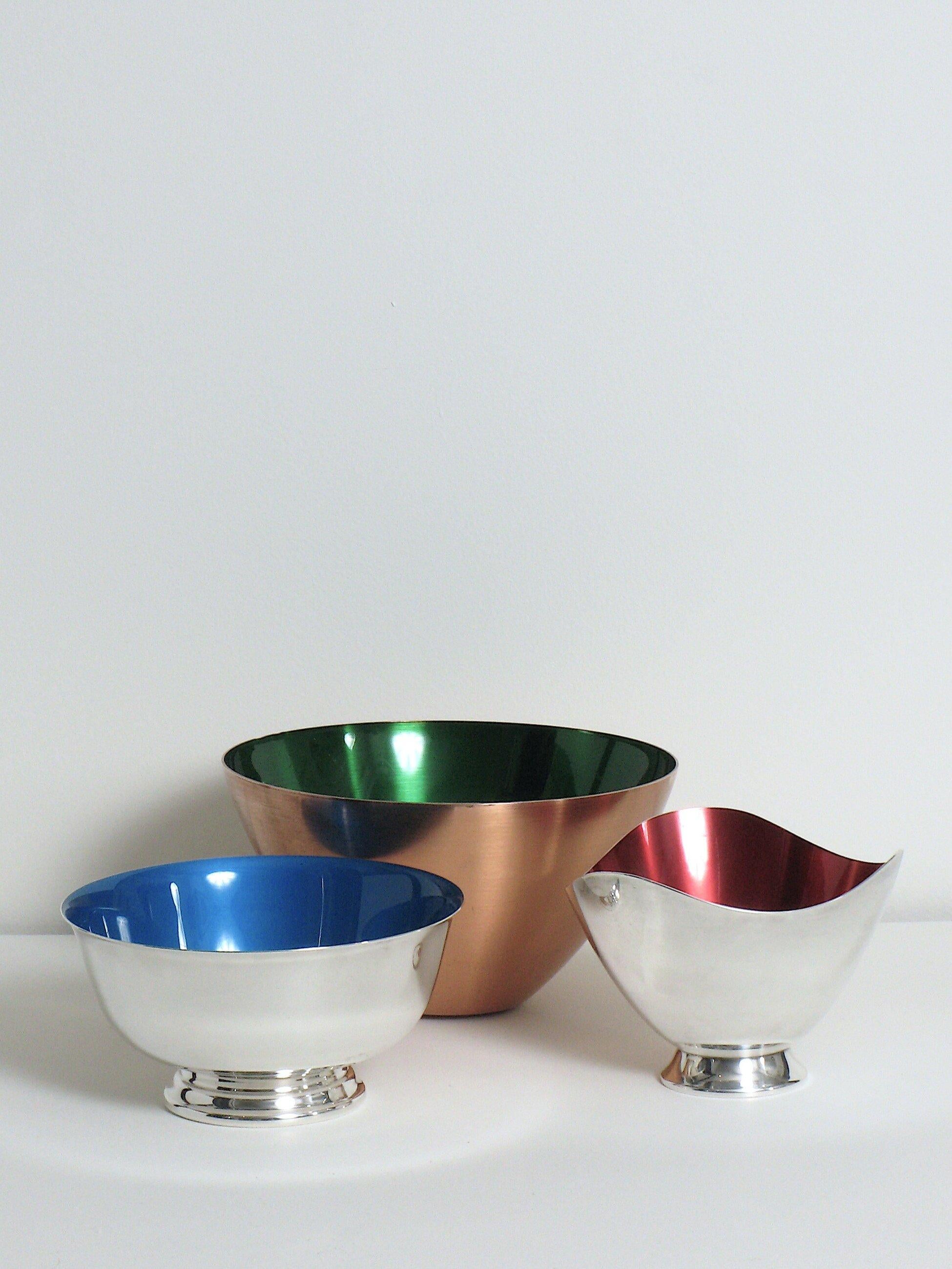 Danish and American Mid Century Enameled Bowls 

In excellent condition. Very light surface scratches. Red bowl has small scratch in enamel at bottom.

Silver and copper plating exterior, enamel interior.

DIMENSIONS: RED: 5.5 inches wide x 4 inches