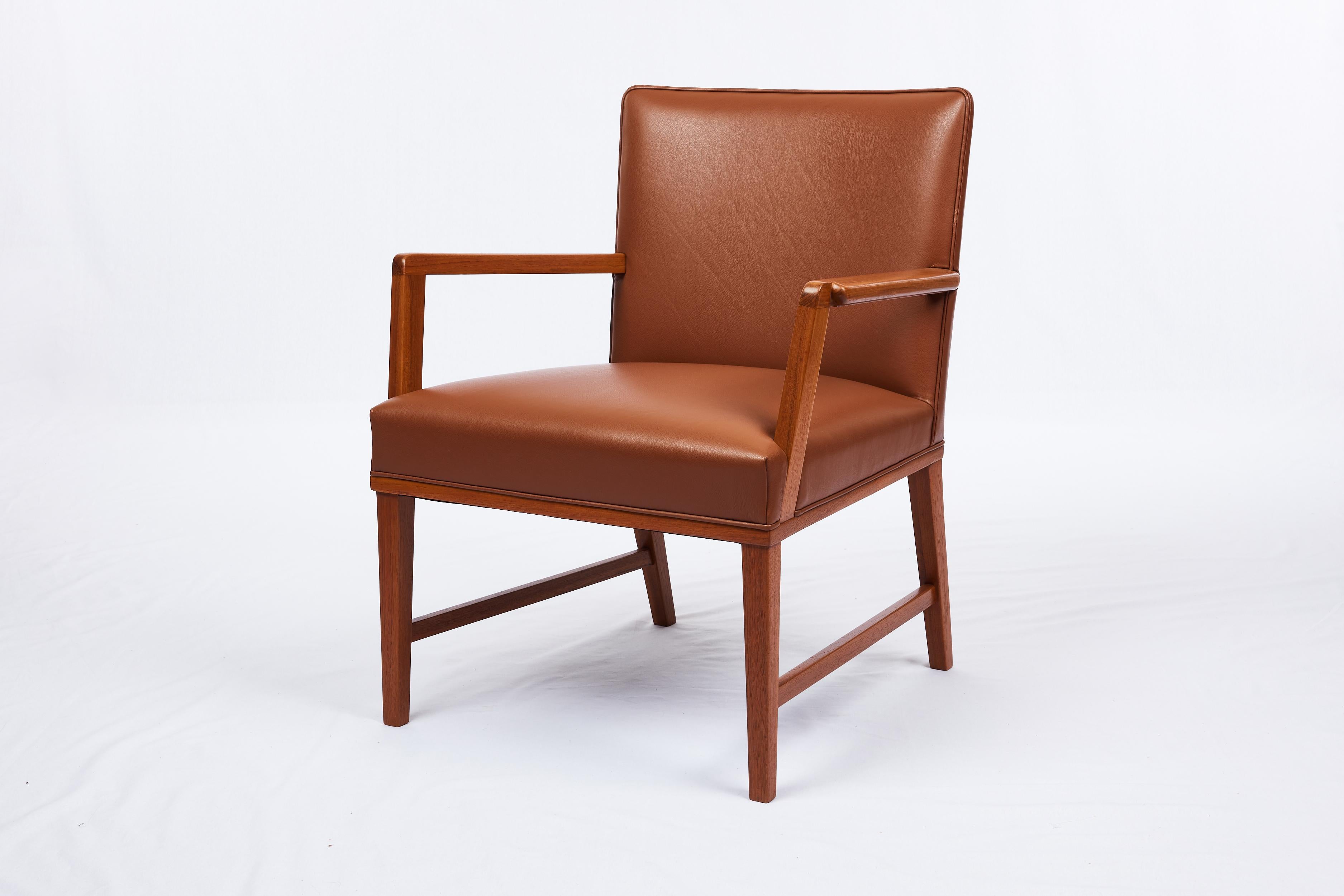 Danish armchair. Wood is Teak. New Leather. 1960's.
