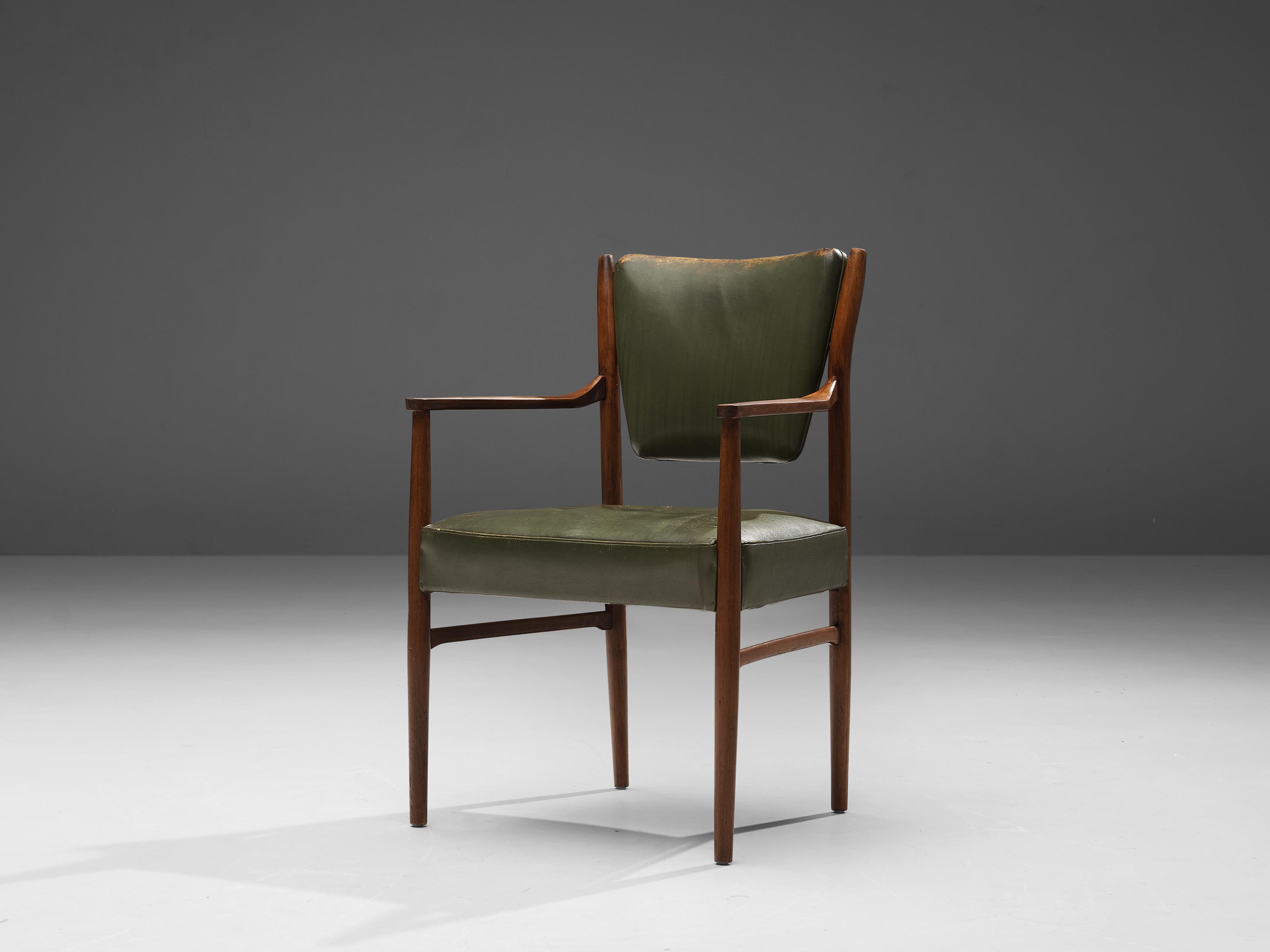 Armchair, walnut, leather, Denmark, 1950s

This elegant armchair in olive green leather and walnut shows signature characteristics of Danish modern design. The frame is modest and very well executed with wonderful details. The armrests are sculpted