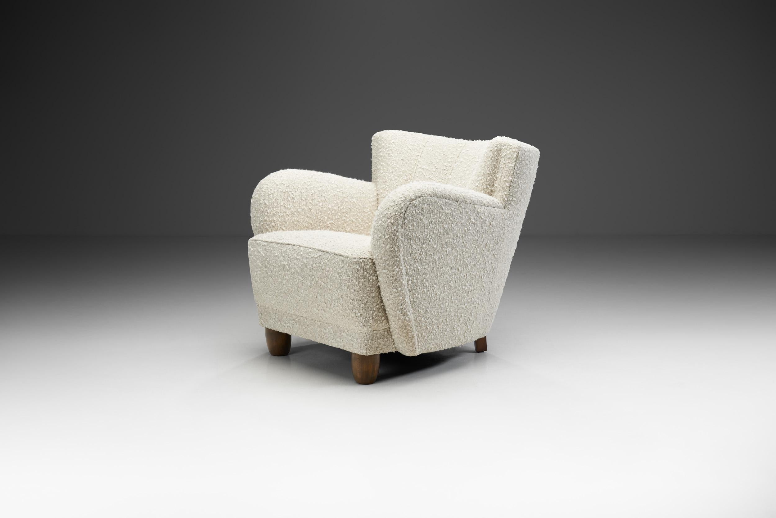 This early Danish mid-century armchair is a great example of the unification of comfort and delicate design elements. The touch of Danish Modernism is recognizable in the exquisite materials, the craftsmanship, and in the elegantly curved and