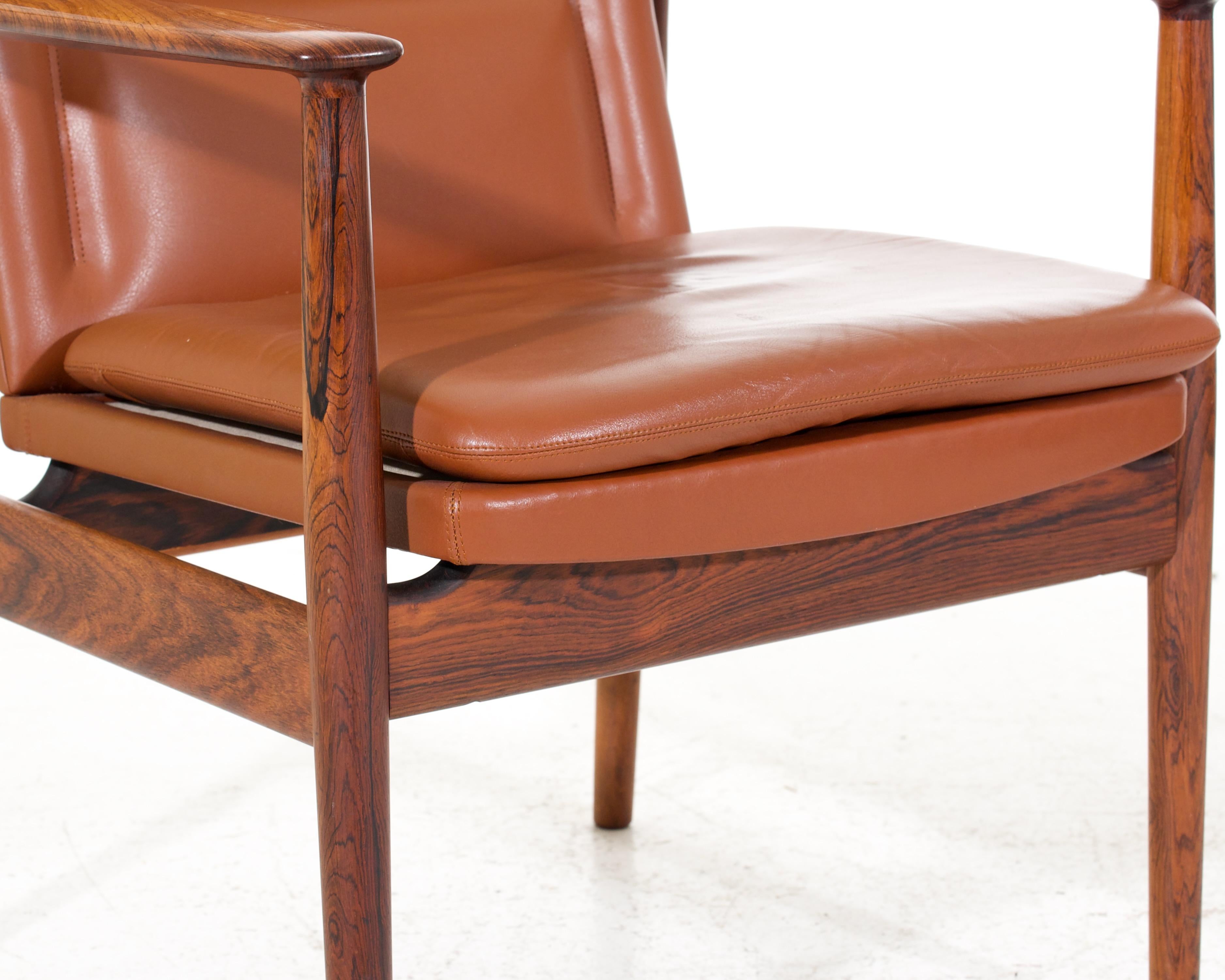 Pair of Danish armchairs in Jakaranda and leather, Arne Vodder for Sibast, Denmark, 1960´s.
