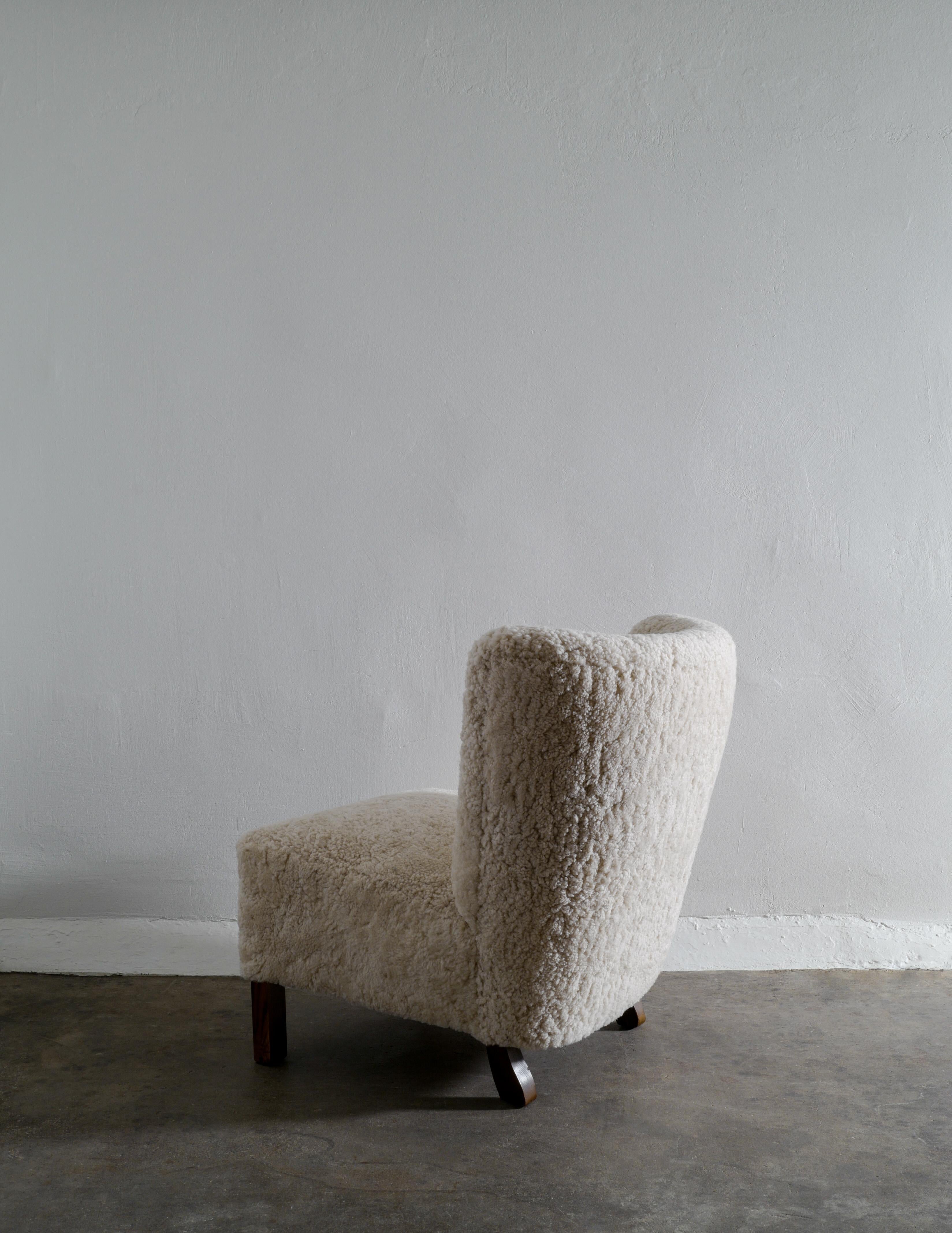 Danish Armless Easy Lounge Chair in Sheepskin Produced in Denmark 1940s In Excellent Condition In Stockholm, SE