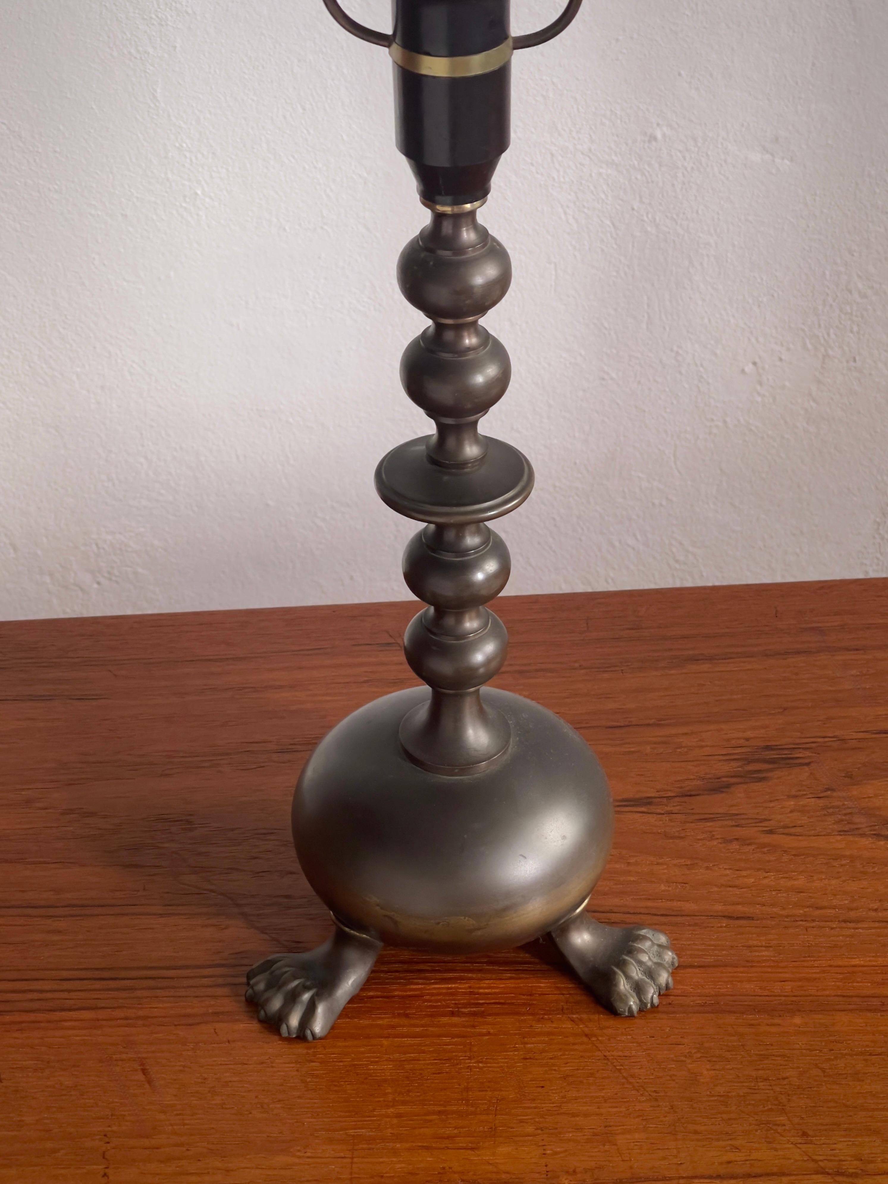 Patinated Danish Art and craft table lamp in patinated bronze with lions feet Denmark 1900 For Sale