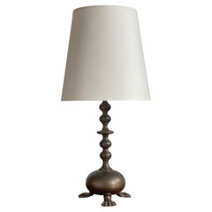 Danish Art and craft table lamp in patinated bronze with lions feet Denmark 1900