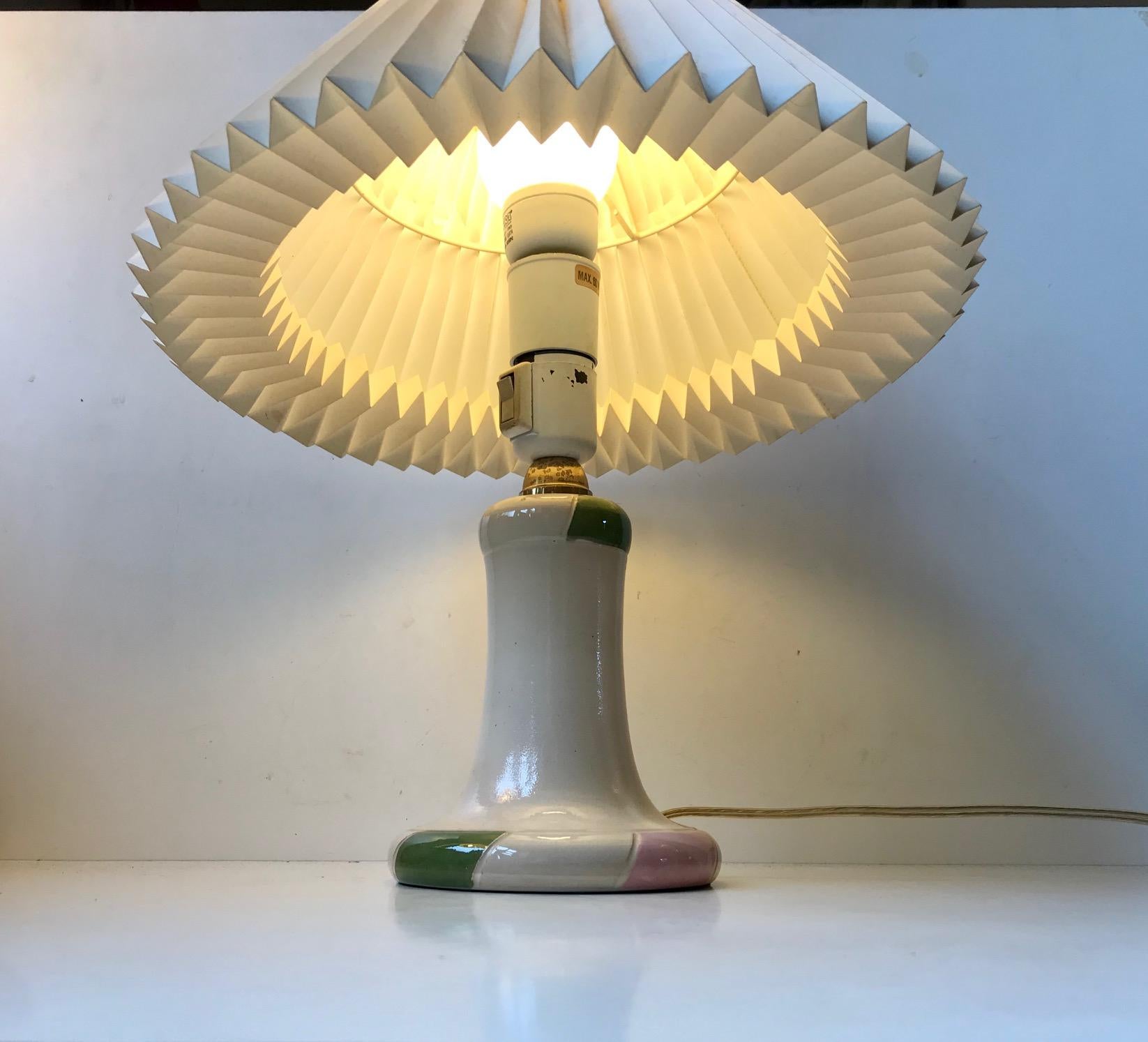Gourd shaped Art Deco revival table lamp from Danish Studio ceramic workshop Dågård. Created during the 1970s in a style that mimics Art Deco. This light features on/off switch to the socket/top. Notice that the shade is not included. Please