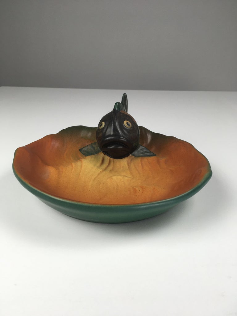 Danish Art Nouveau fish ash tray / bowl designed by Axel Sørensen in 1927 for P. Ipsens Enke.

The art nuveau ash tray / bowl feature a well made lively fish and is in excellent condition.

Ipsens Enke (1843 - 1955) was a very succesfull company