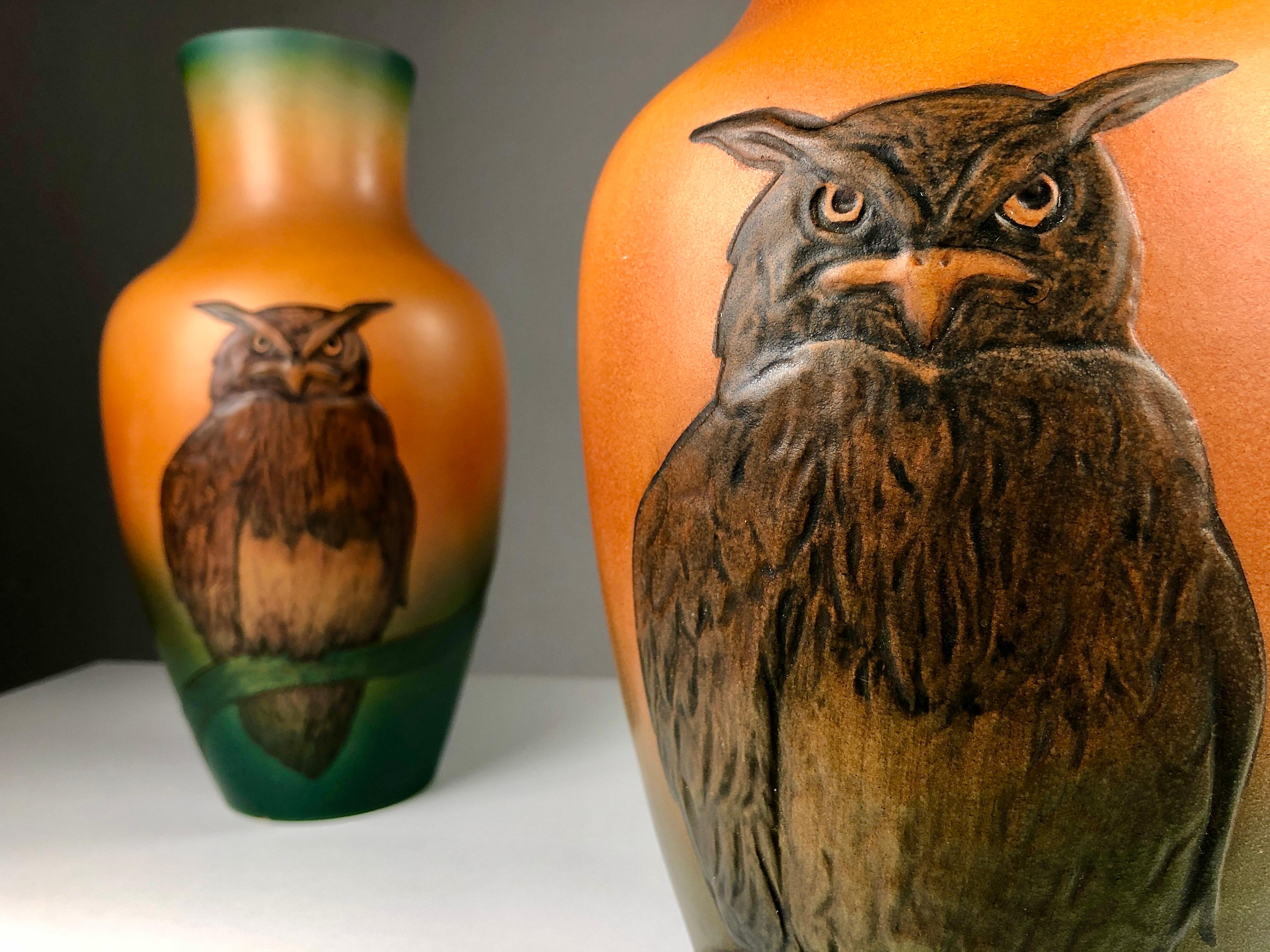 Danish Art Nouveau Owl vases by J. Resen Stenstrup for P.Ibsens Enke in 1909.

The set of two art nouveau vases that feature a very well made lively owl at the frontside of the vase and a bat on the backside of the vase are in very good