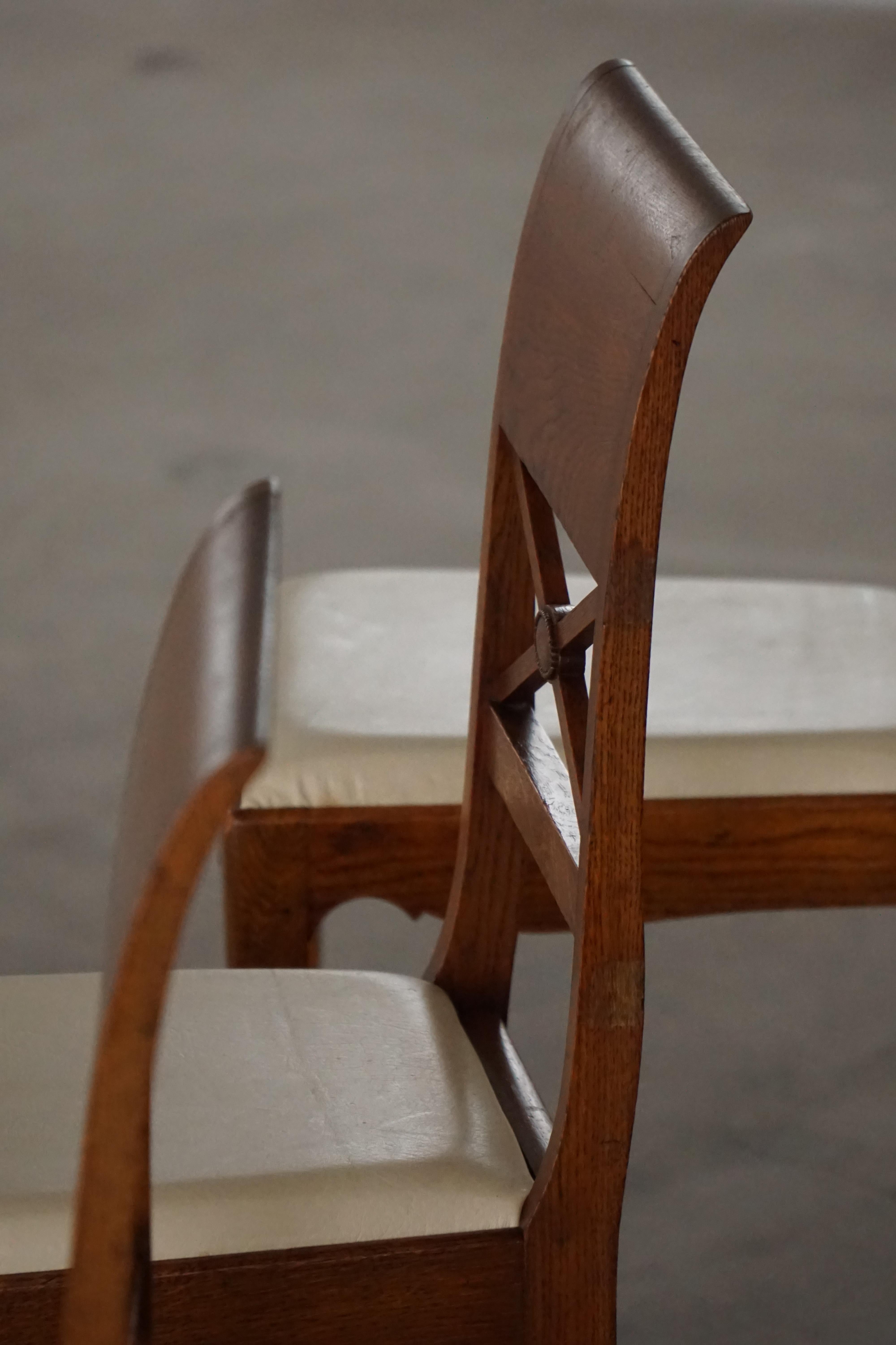 Pelle Set di 8 sedie da pranzo scultoree in Oak e pelle, anni '20, Art Nouveau danese in vendita