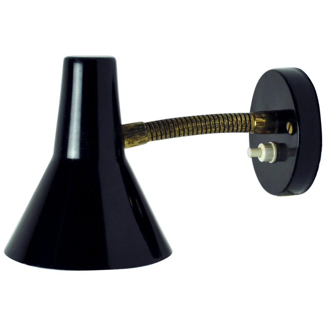 Danish Black Wall Lamp with Adjustable Brass Arm For Sale