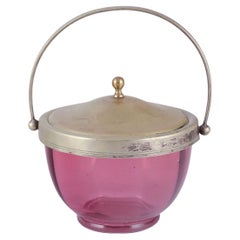 Danish bonbonniere in purple art glass with a lid in silver-plated metal.