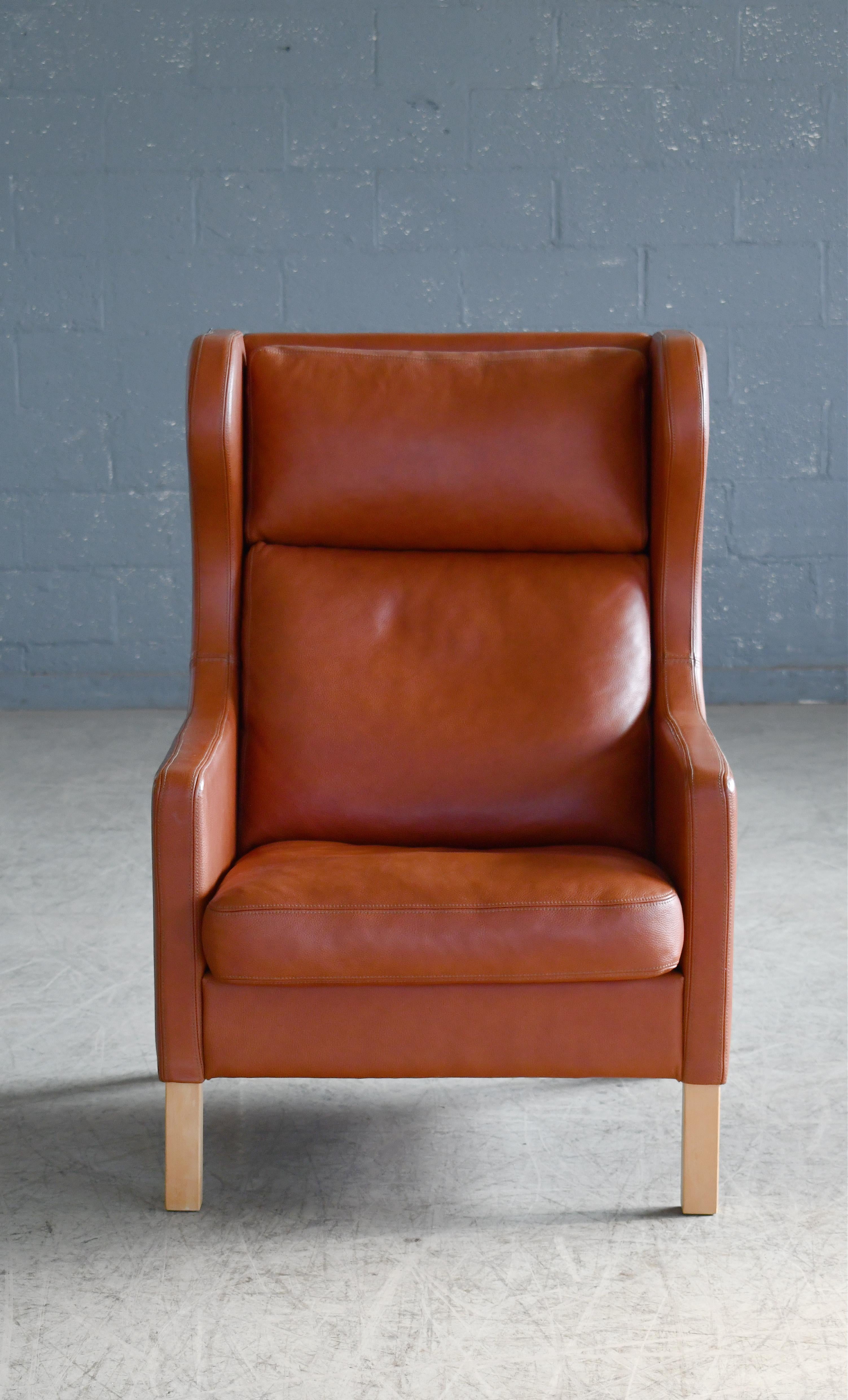 Skalma produced version of Børge Mogensen's famous lounge chair model 2204. Very elegant classic mid-century highback  lounge chairs from the golden era of Danish modern.. A perennial design that will just never go out of style. While Borge