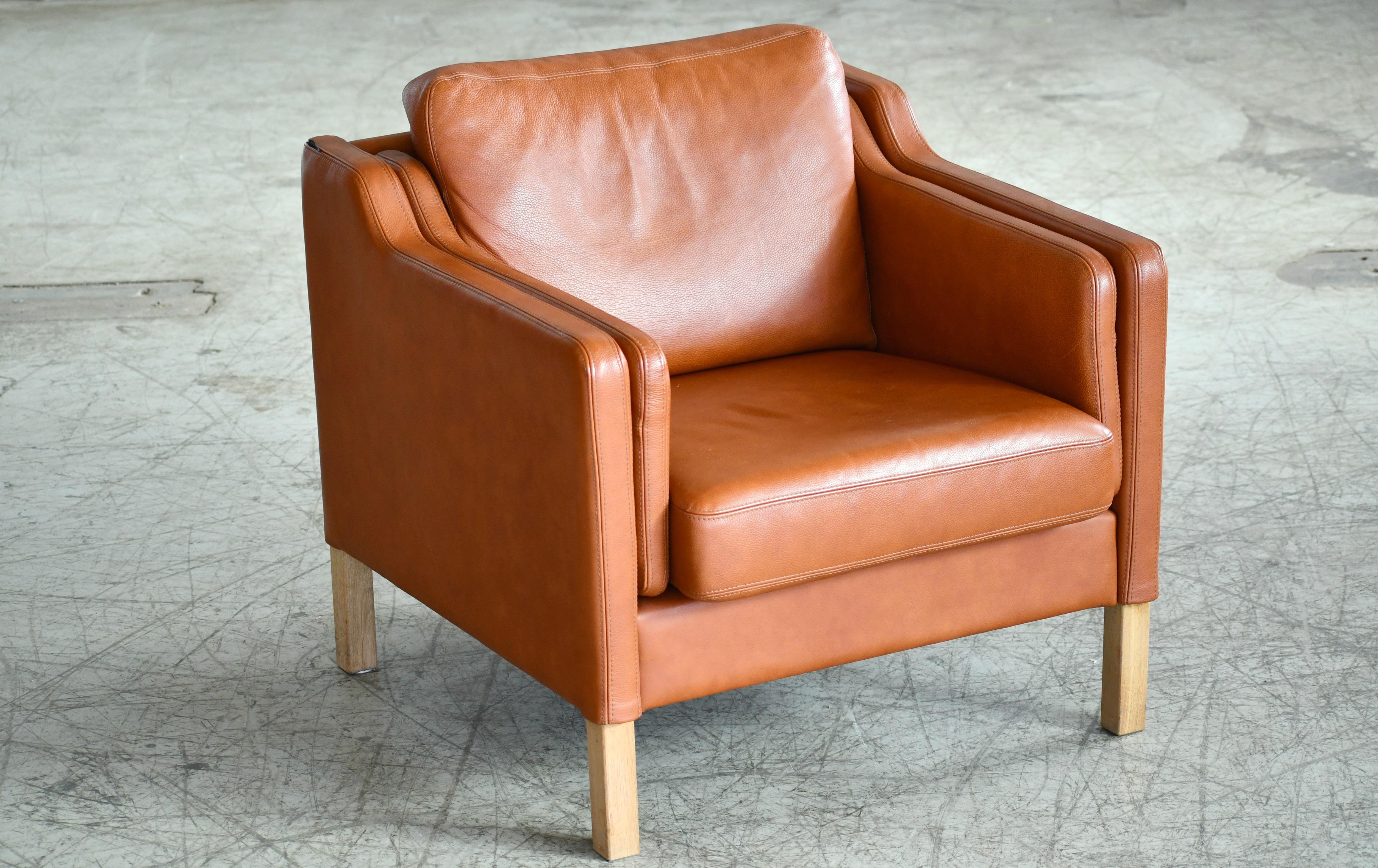 cognac leather chair and ottoman
