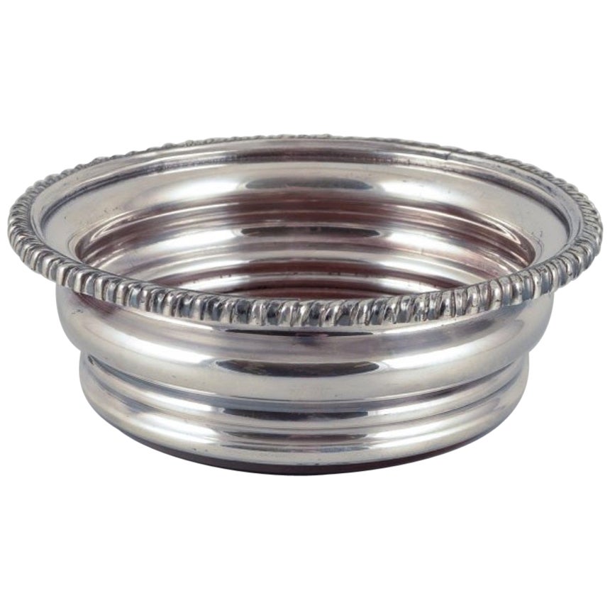 Sous-verre danois en argent plaqué et bois. De haute qualité et lourd.