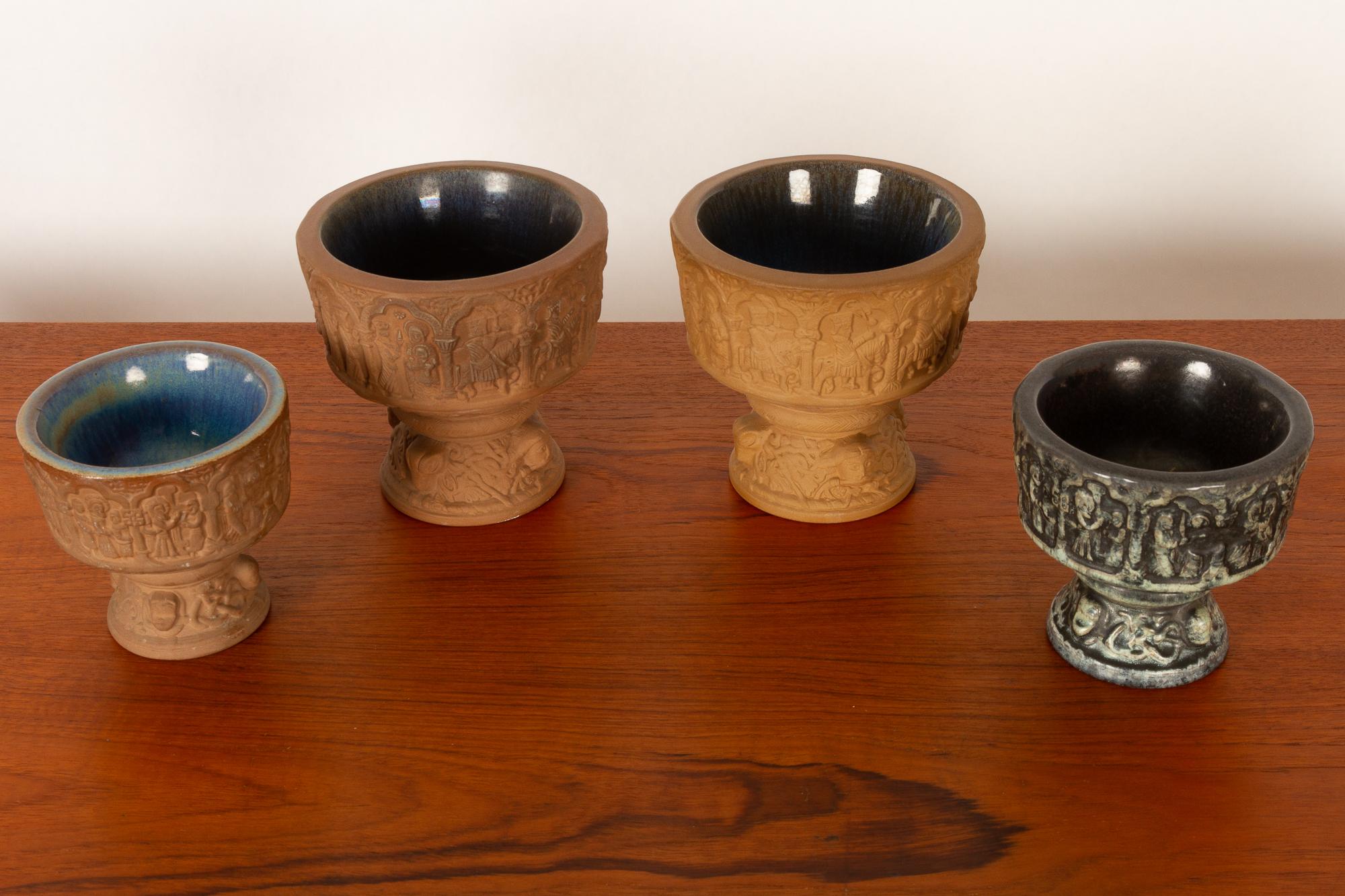 Danish bowls by Michael Andersen, 1960s.
Set of four ceramic cups inspired by a baptismal font from the 13th century located in a church on the Danish island of Bornholm.
The cups are raw ceramic on the outside, and glazed inside. Can be used as
